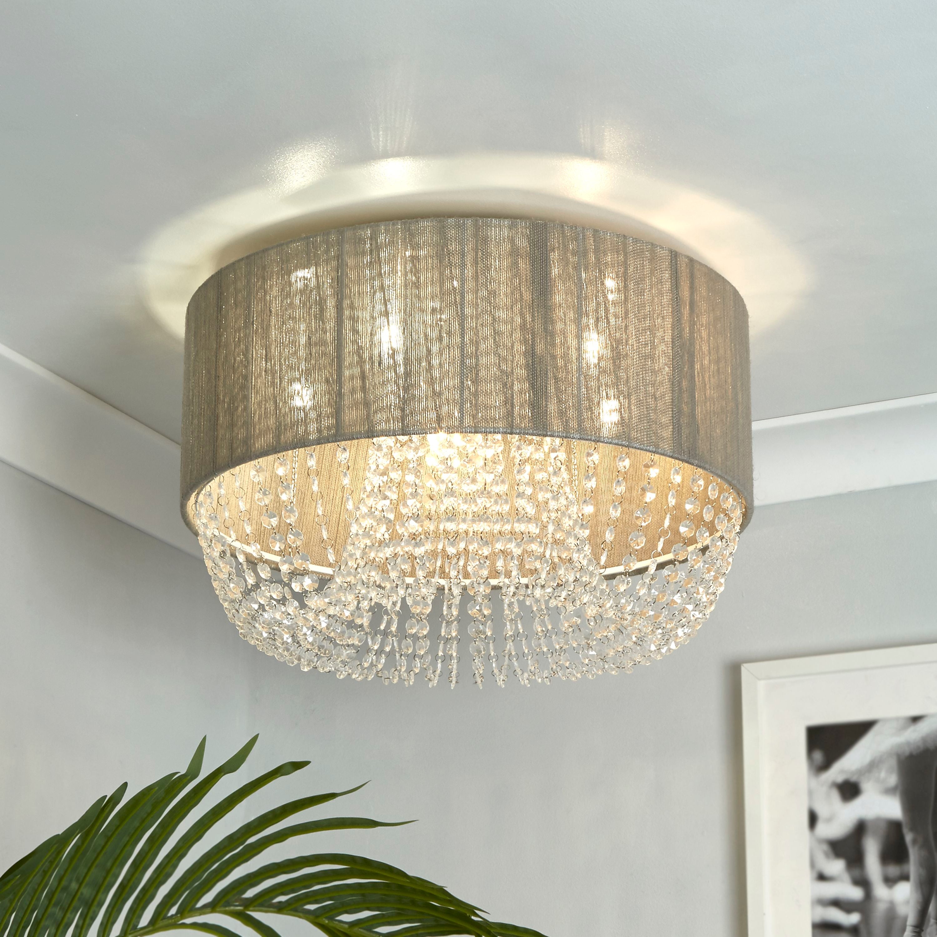 Searchlight Bellano 5 light flush ceiling light fitted to a ceiling above a plant, in a room with a framed picture