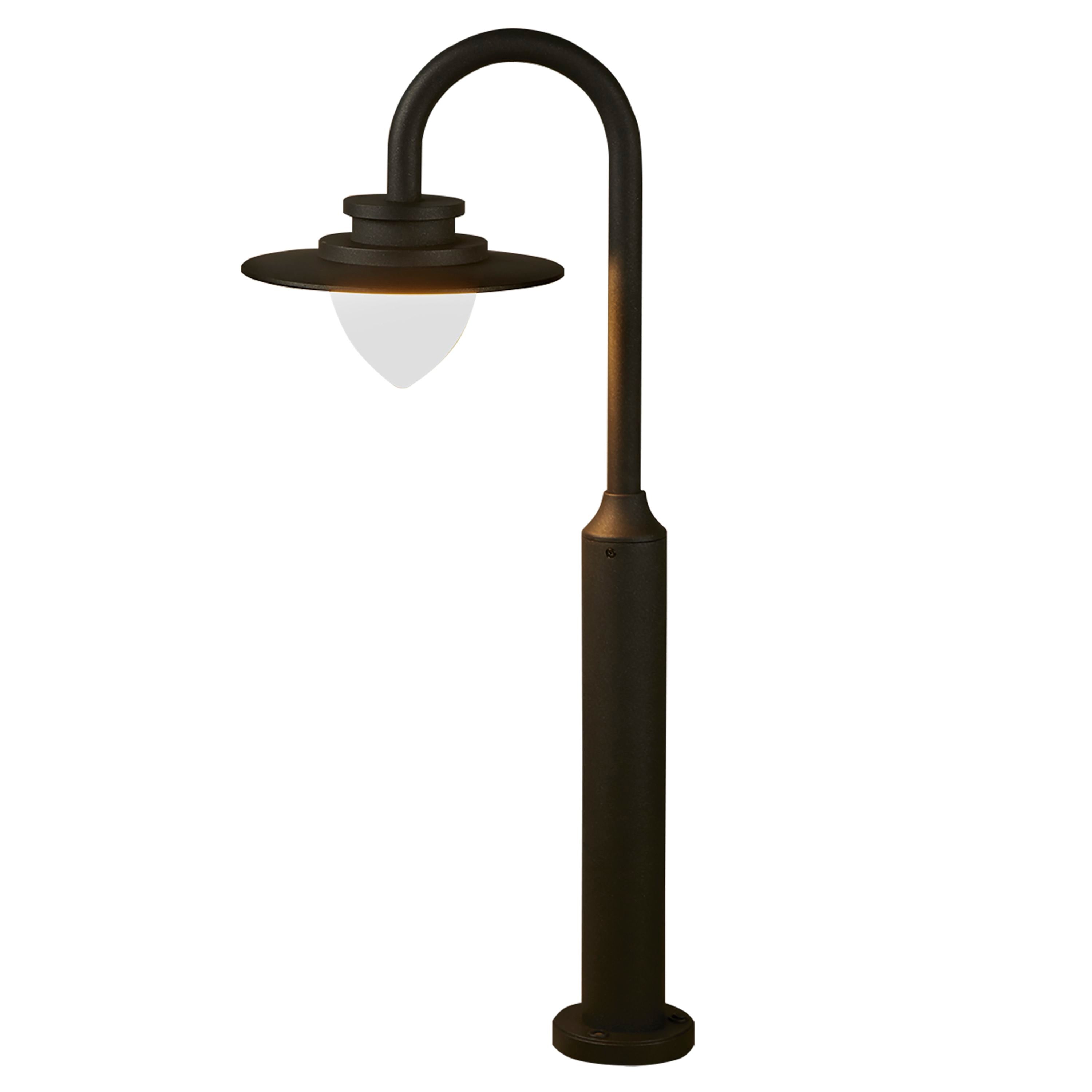 Searchlight Texas outdoor bollard light in graphite, studio shot from a slightly different angle showing the post and lit diffuser glowing warm white