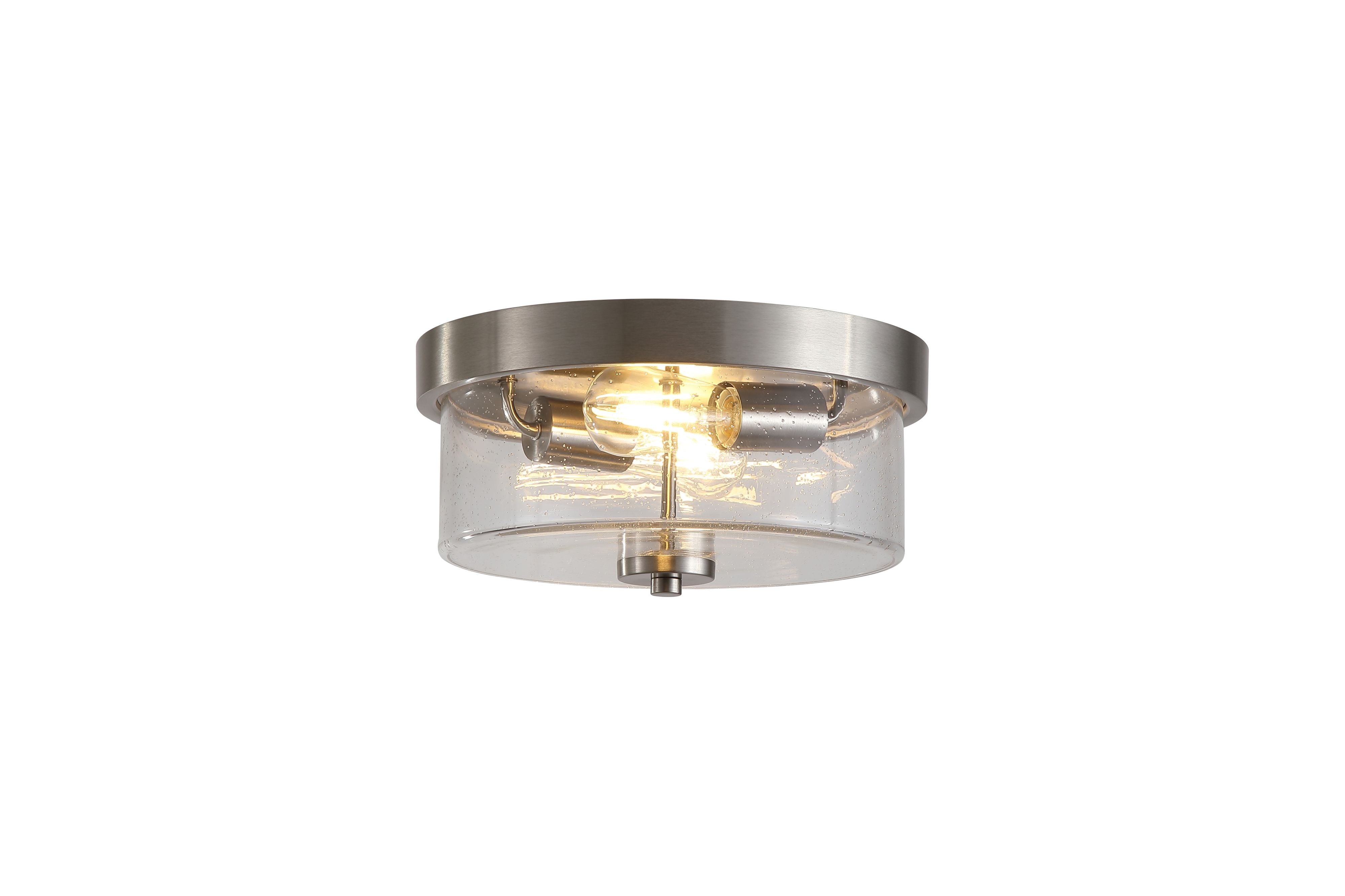 Searchlight Preston 2 light flush ceiling light in satin silver, studio shot with the seeded glass drum lit and bulbs visible