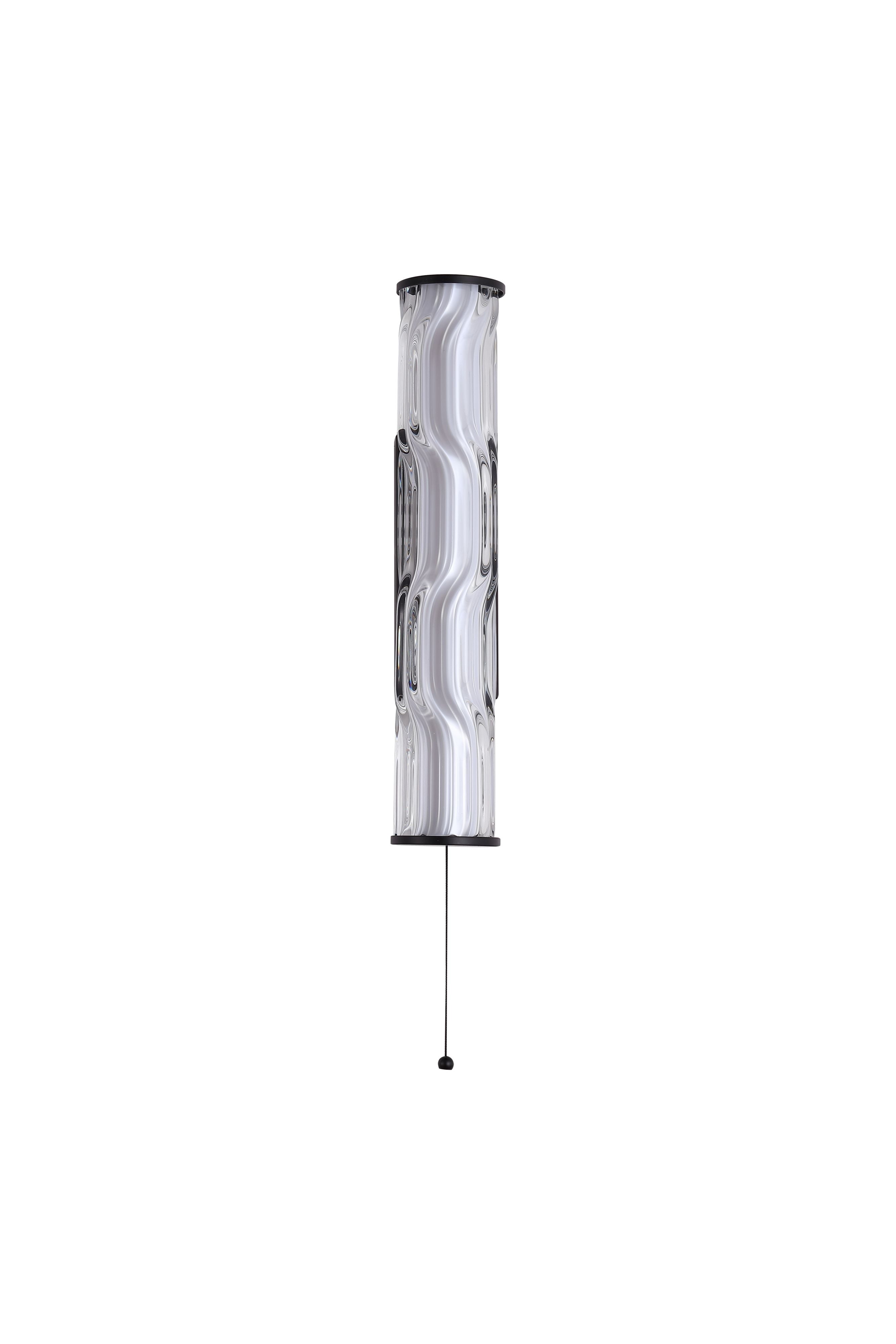 Searchlight Vibrate LED wall light with wave ridge glass diffuser and matt black frame, straighter front angle showing the pull cord switch