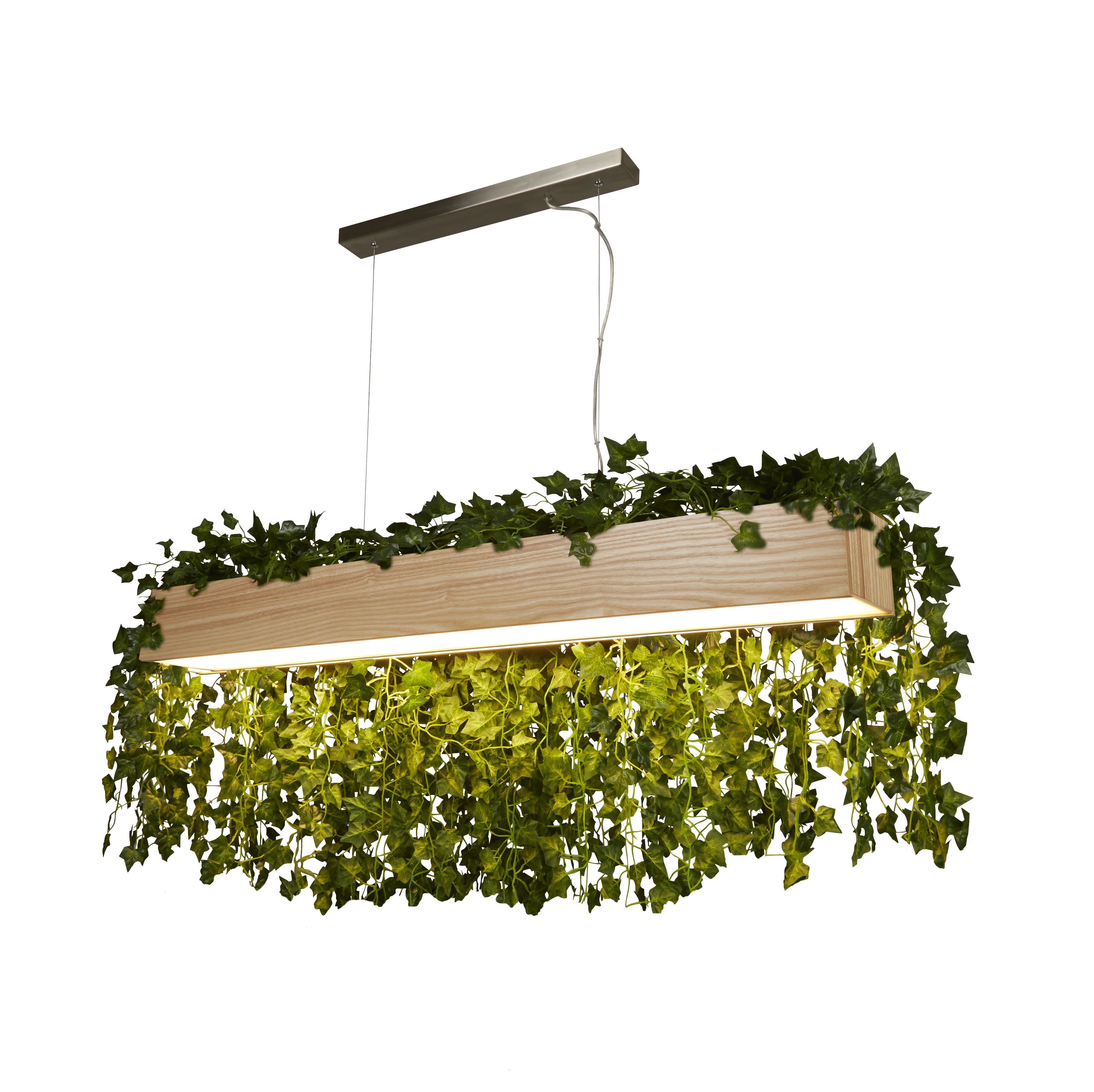 Searchlight Ash wood LED bar pendant at an angle, with trailing ivy styled across the top of the bar and the LED strip glowing along the underside