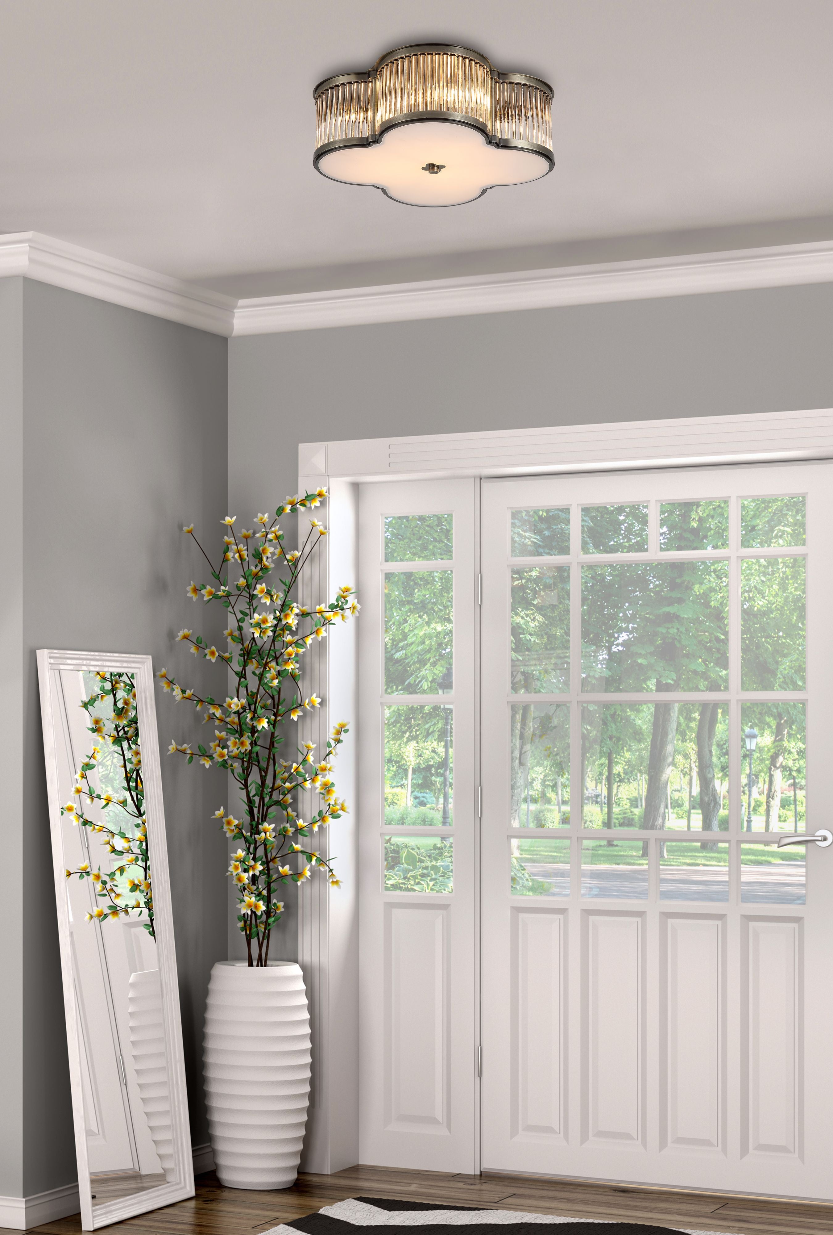 Searchlight Lotus 3 light flush ceiling light in antique brass installed in a hallway beside a mirror and a potted plant