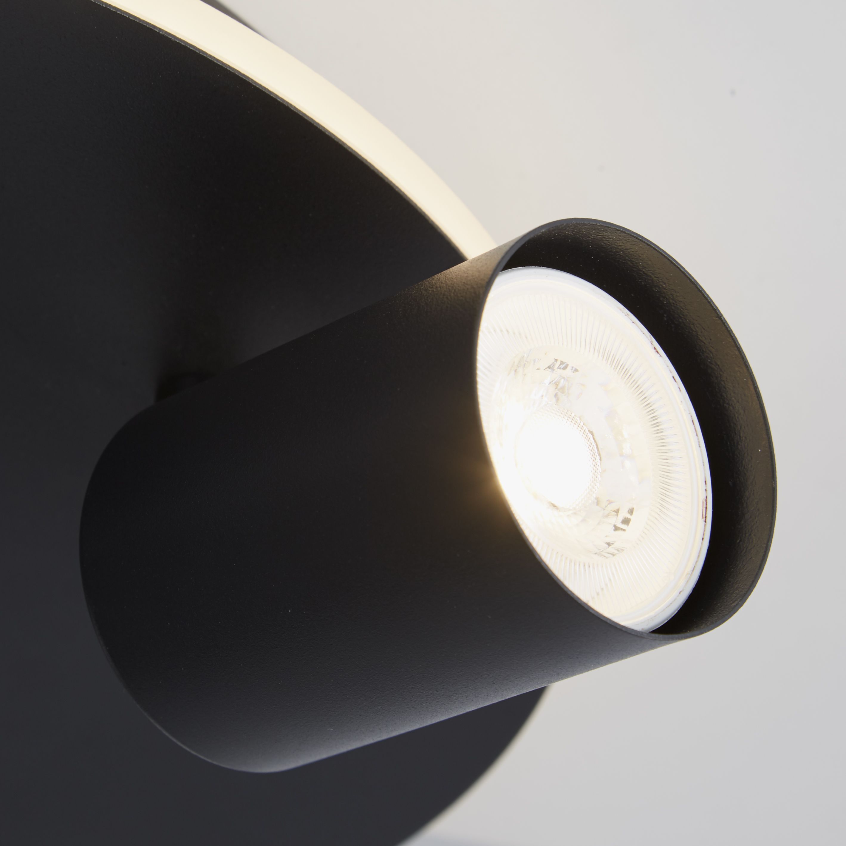 Close up of one San Diego spotlight head showing the GU10 bulb and matt black finish