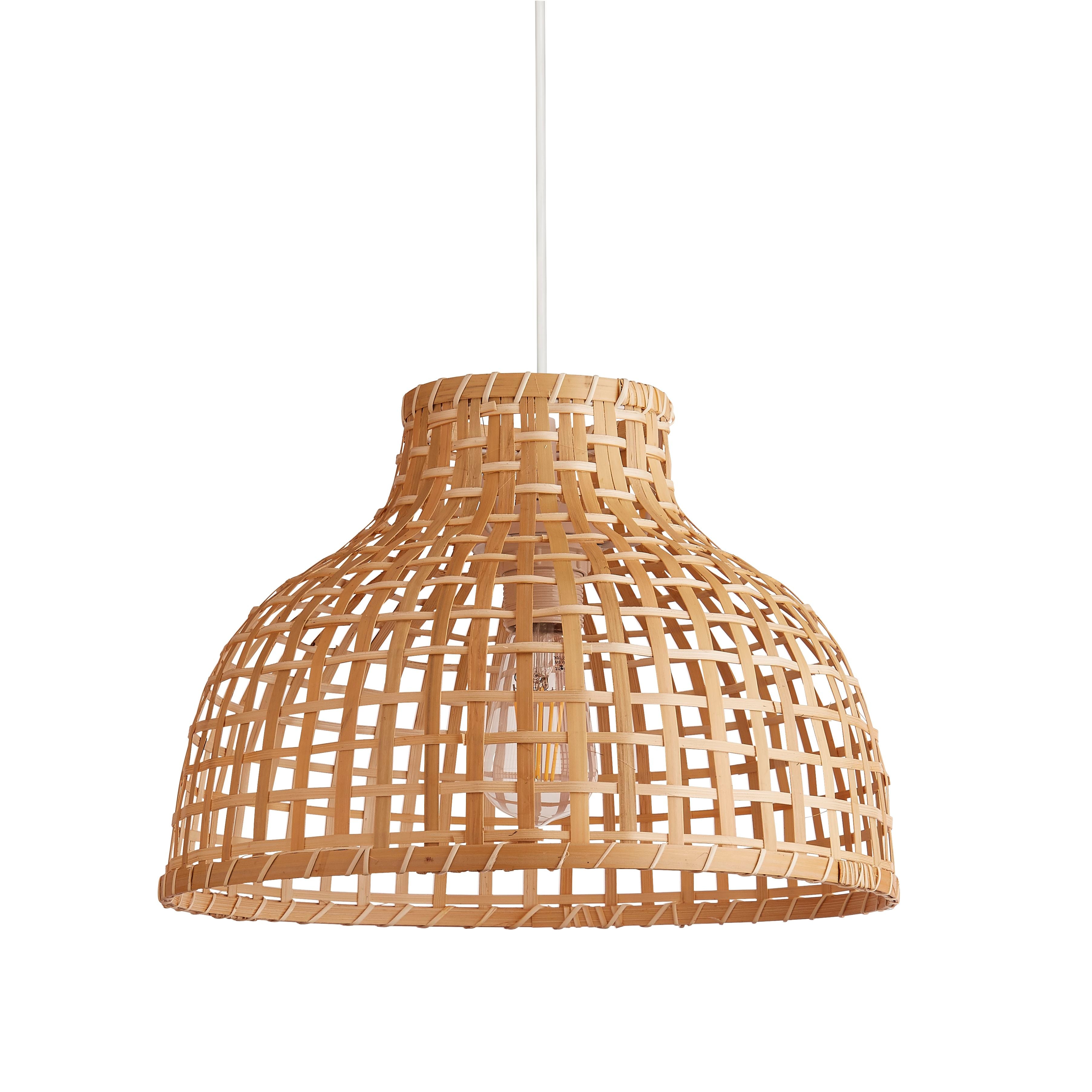 Searchlight Bali Pendant in bamboo shown at a slight angle, highlighting the crossed weave pattern and the visible bulb inside