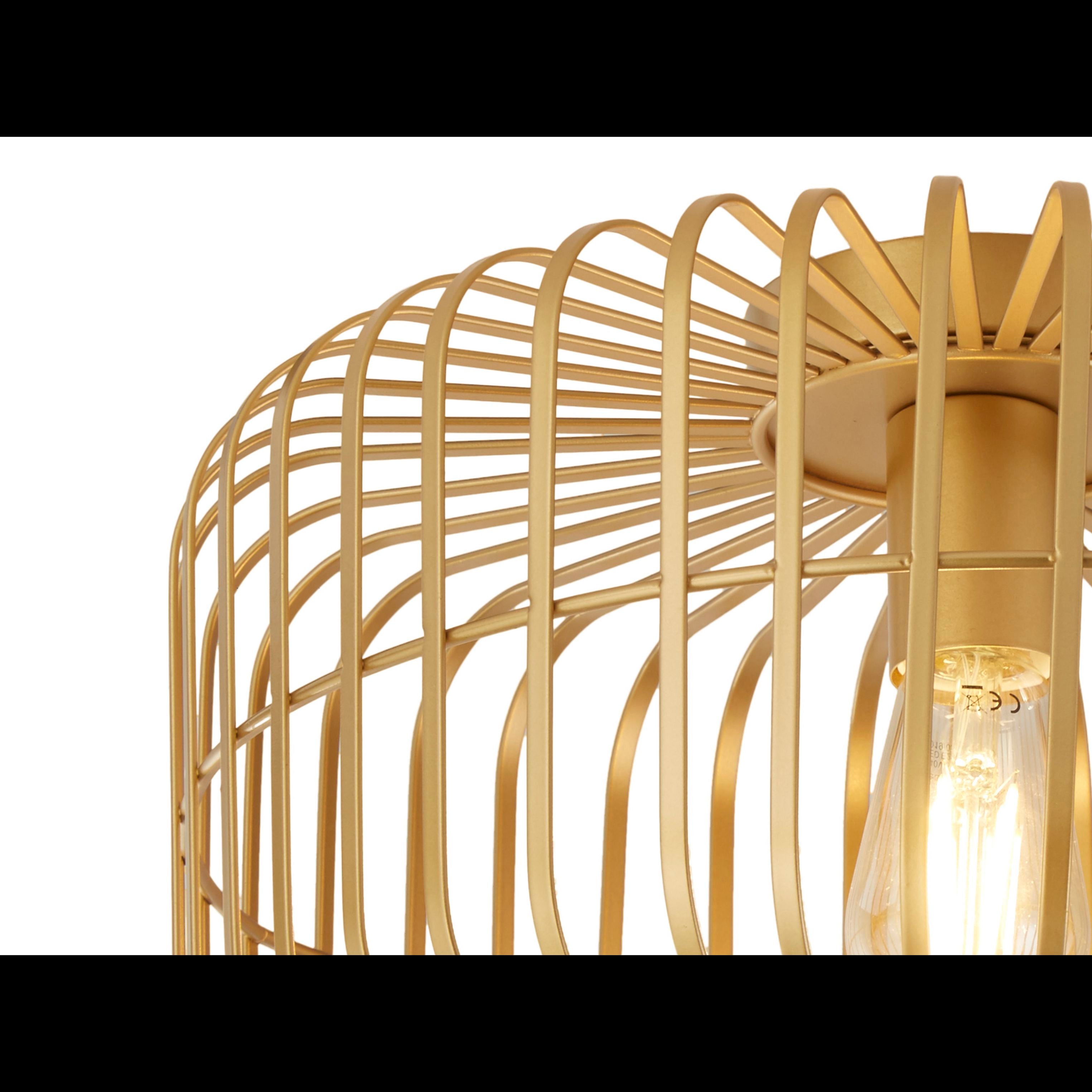 Close up of the Searchlight Crib cage ribs in matt gold steel, showing the lit filament bulb and ceiling mount