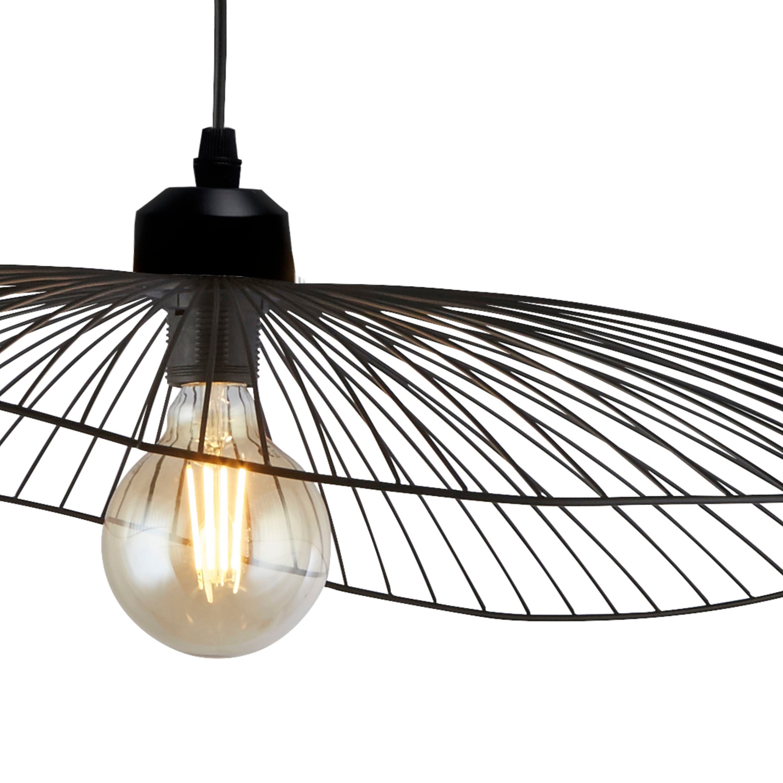 Close up of the matt black wire shade and exposed LED filament bulb on the Wave pendant