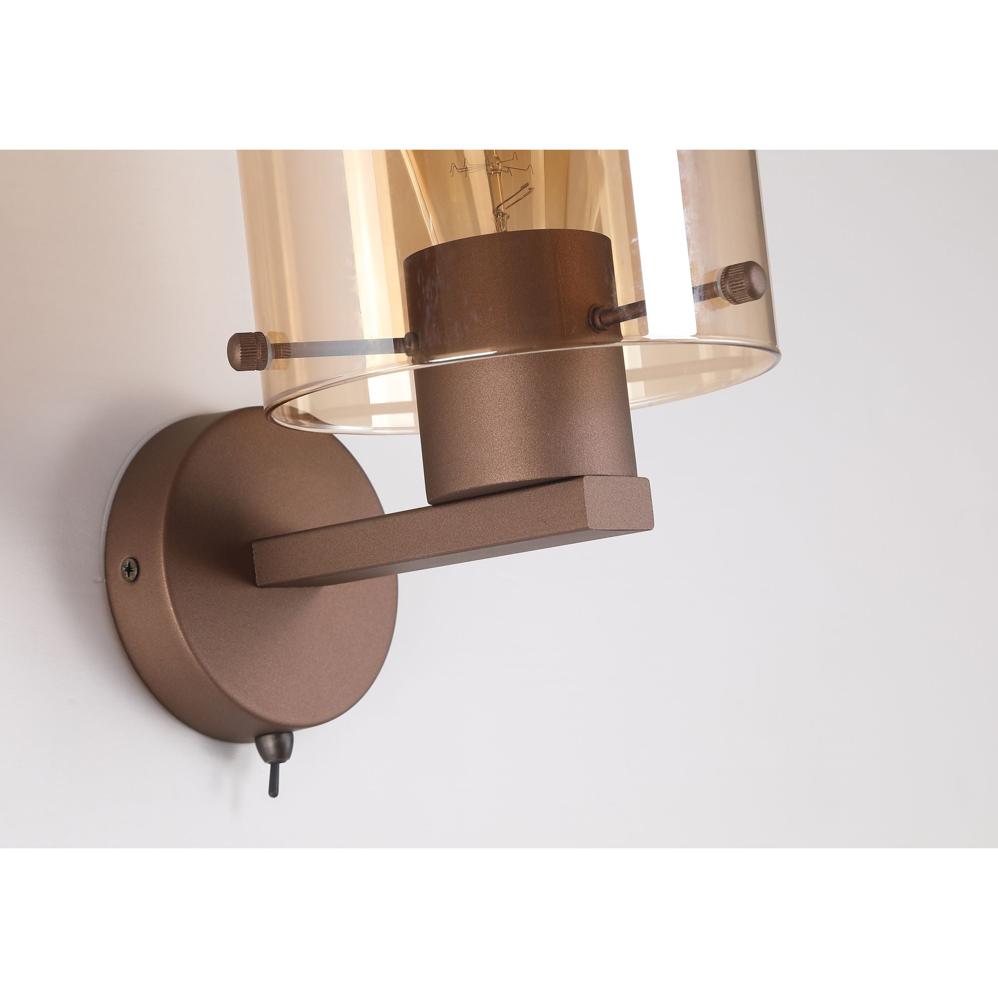 Close up of the Searchlight Sweden wall light showing the mocha metal backplate, pull cord switch and glass retaining pins