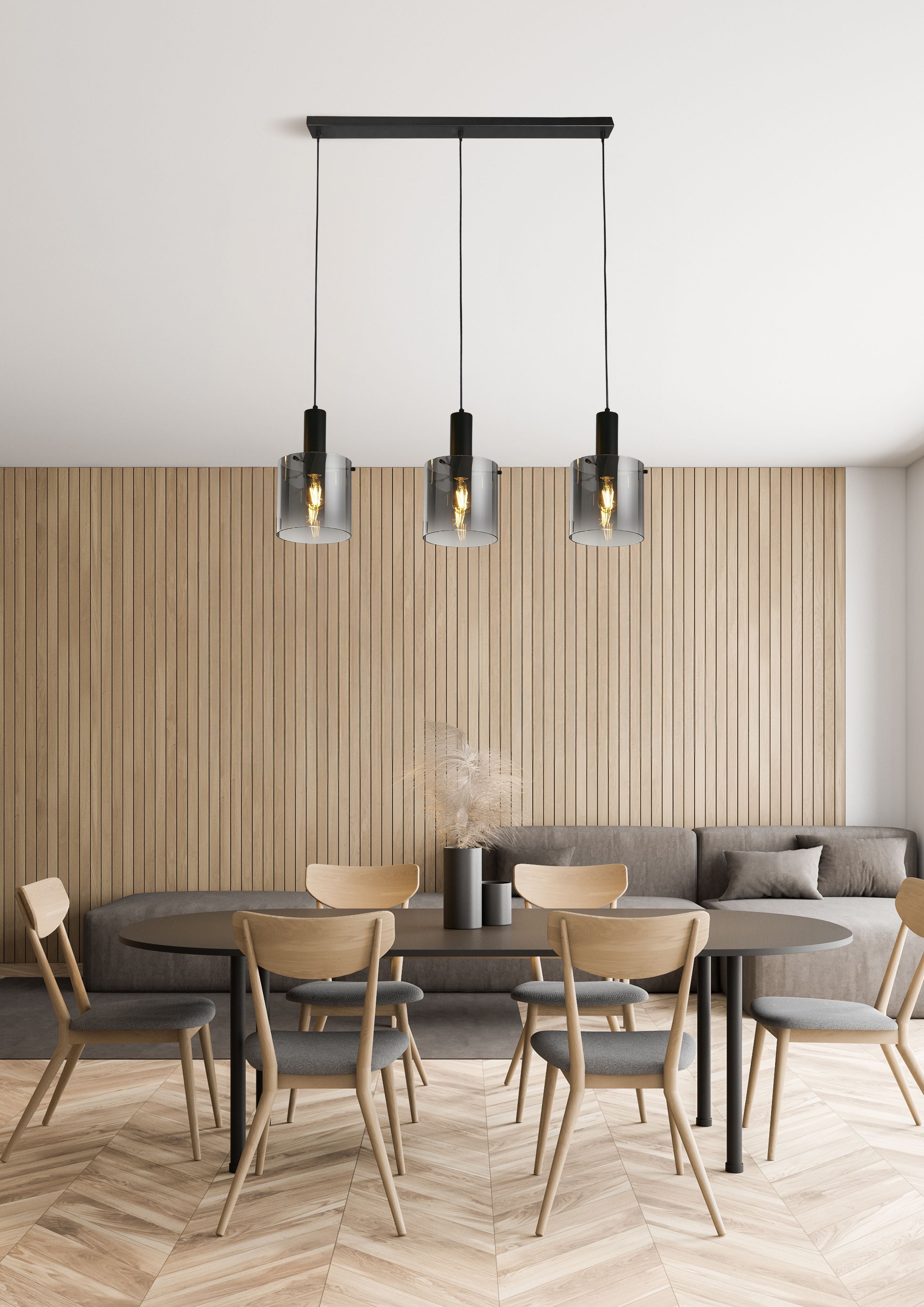 Searchlight Sweden 3 Light Bar Pendant in matt black metal and smoked ombre glass styled above a dining table with a wood slat wall behind