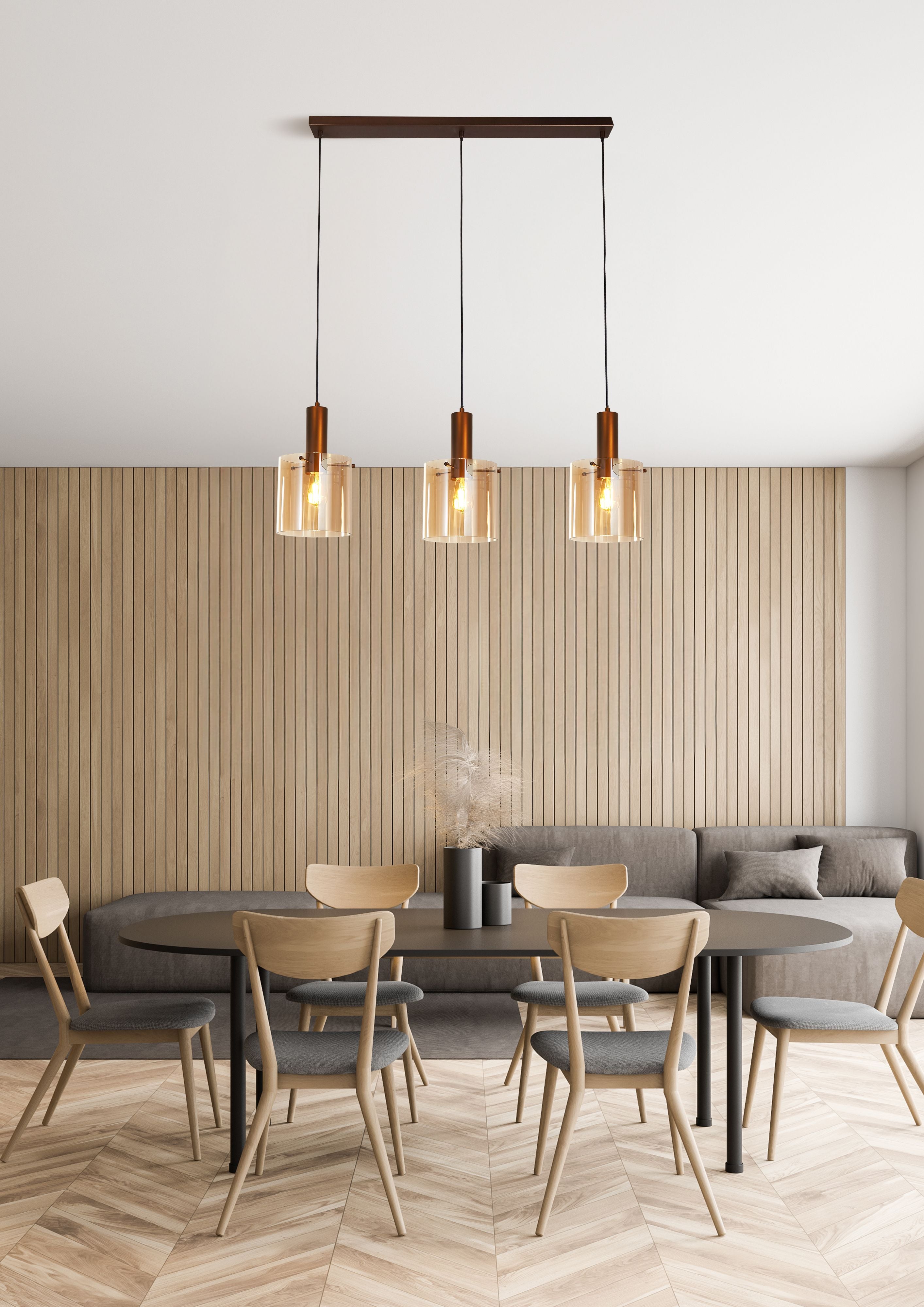 Searchlight Sweden 3 Light Bar Pendant in mocha metal and amber glass styled above a dining table with a wood slat wall behind