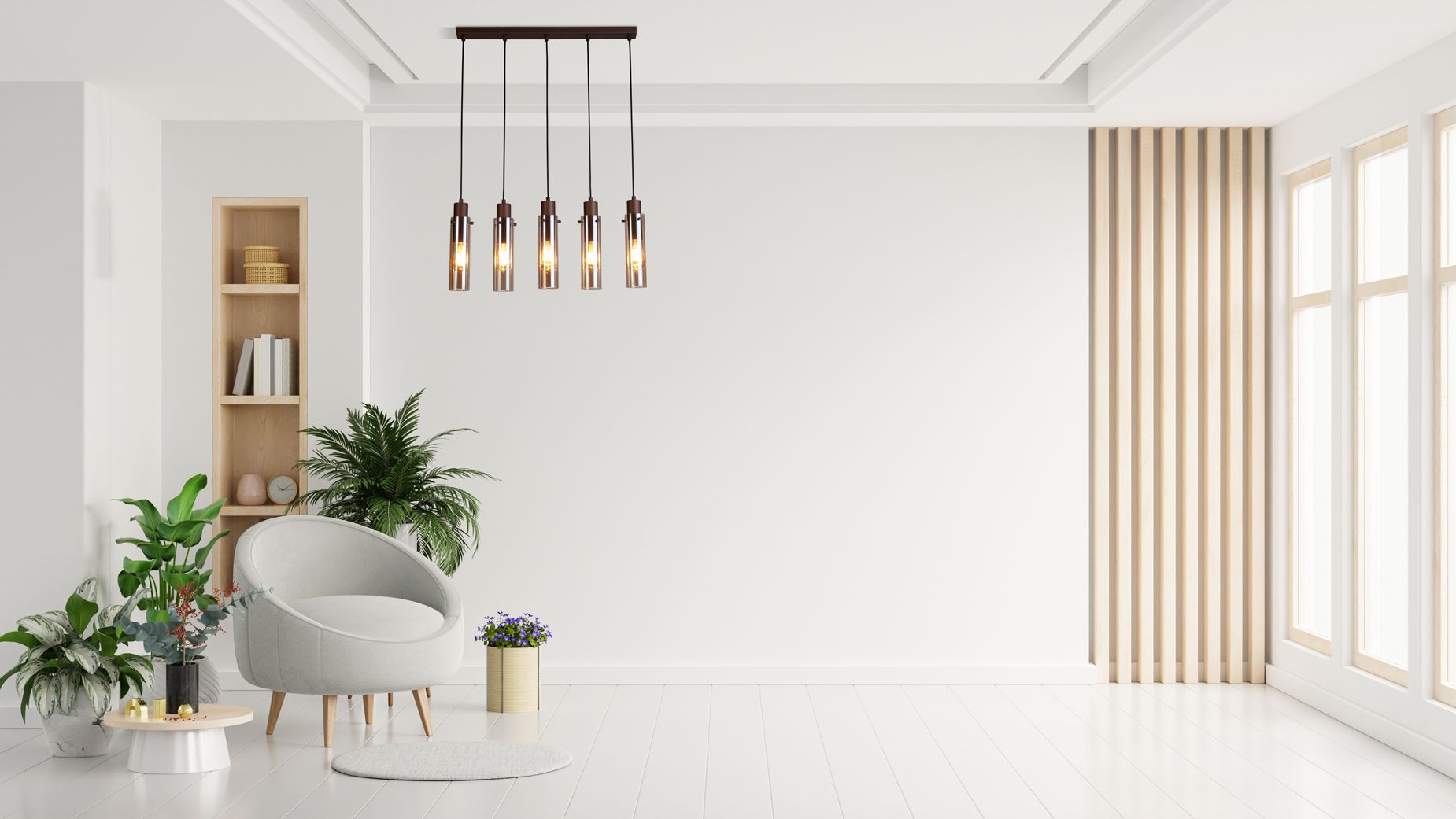Searchlight Sweden II 5 Light Bar Pendant in mocha metal and amber glass styled above an armchair and potted plants in a bright living room