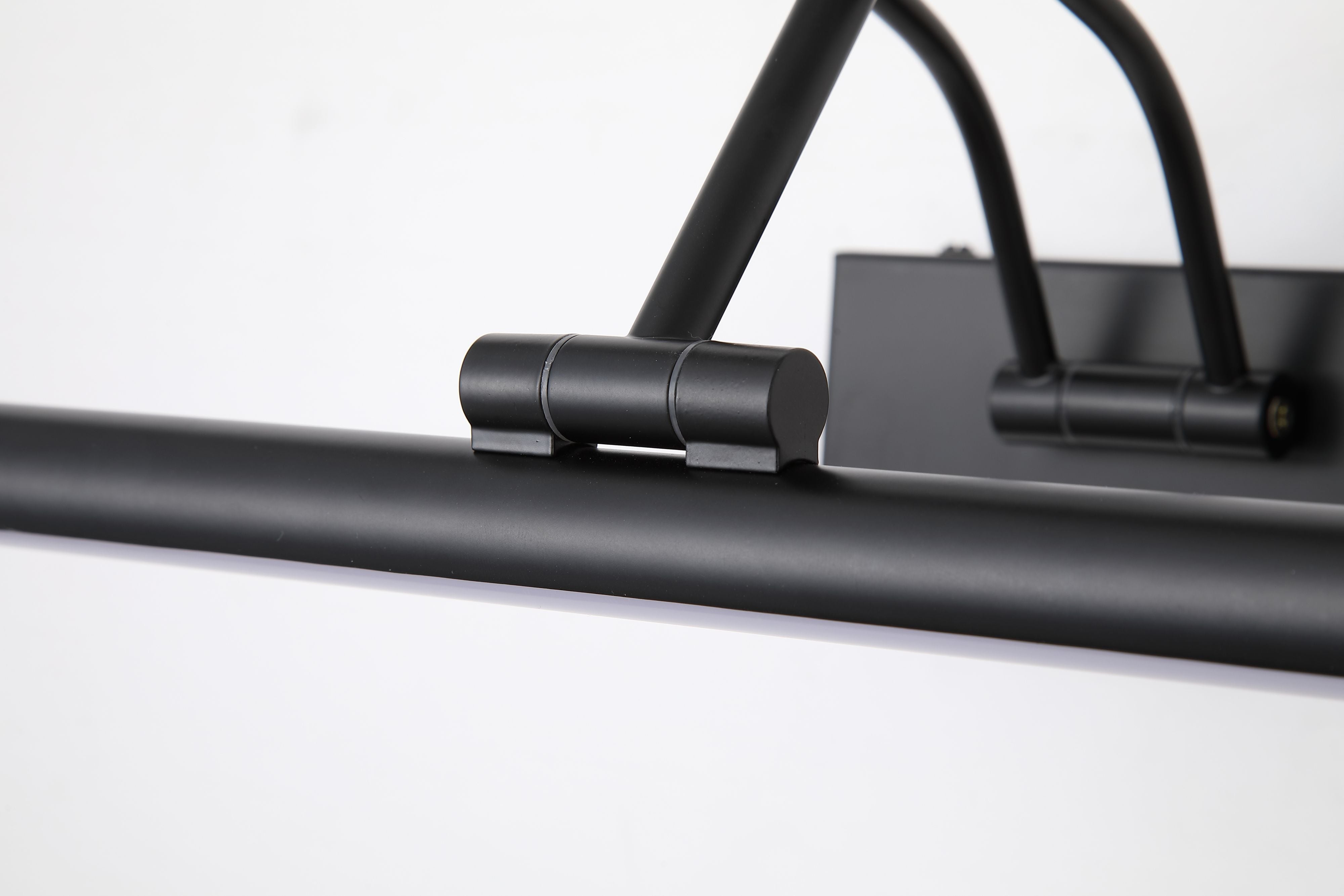 Close up of the Herron wall lamp showing the curved twin arm bracket and mounting pin connecting to the light bar