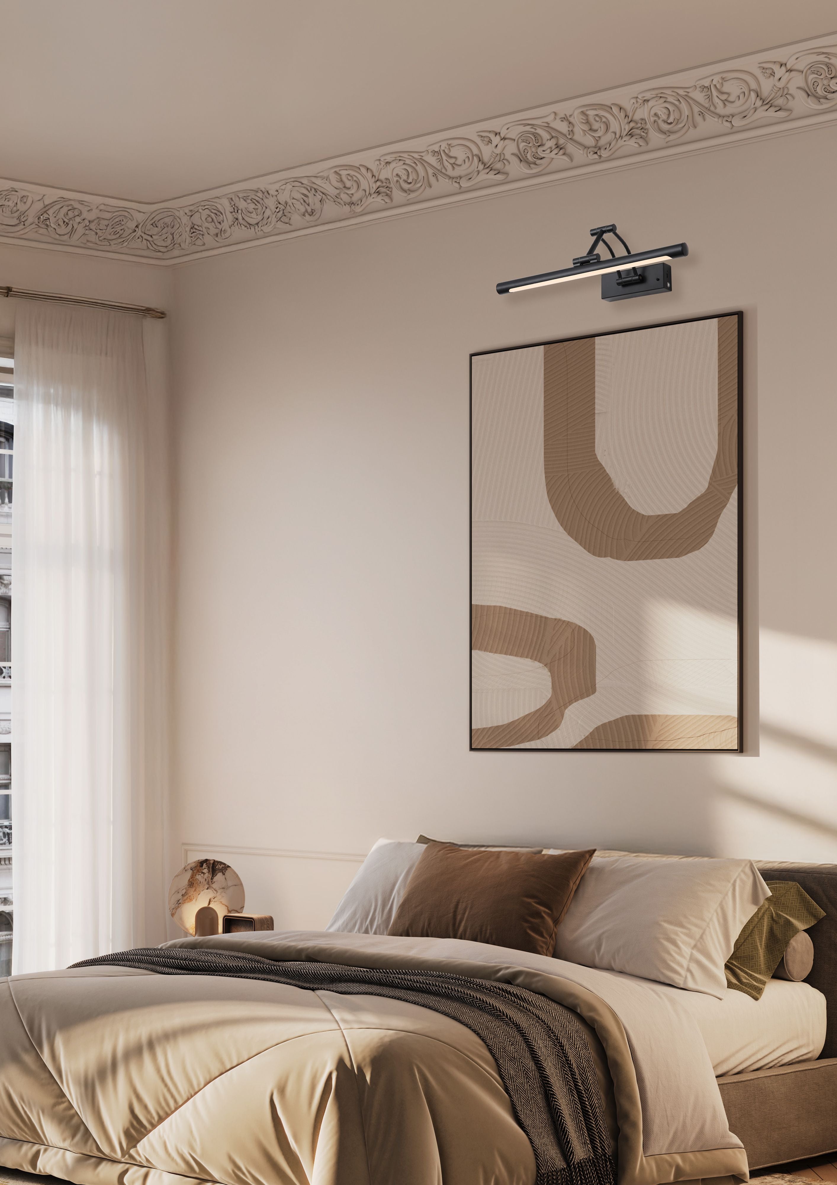 Herron matt black wall lamp mounted above a framed abstract print in a period bedroom with ornate coving