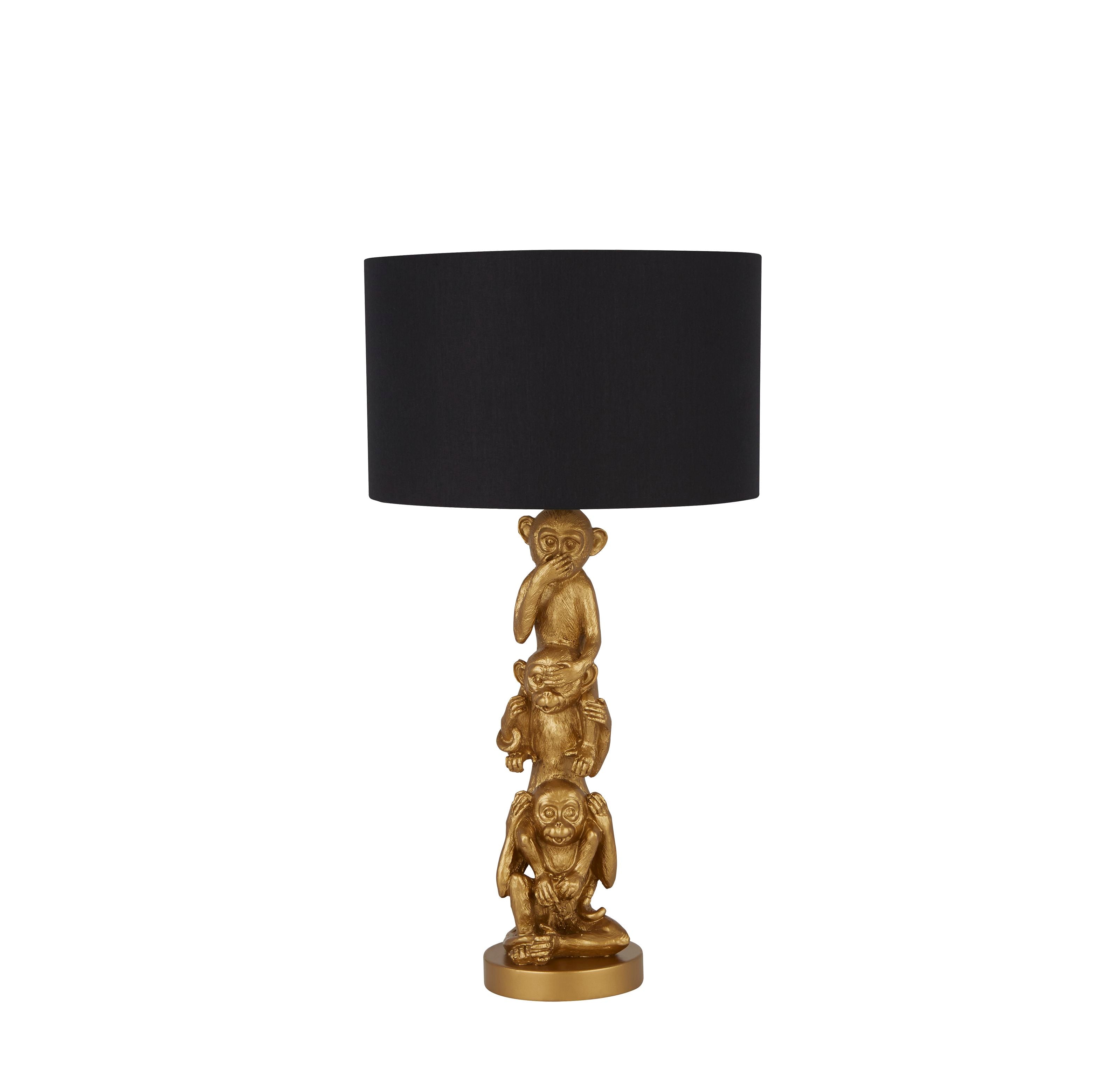 Searchlight 3 Wise Monkeys table lamp in gold resin with a black fabric drum shade, front view on a white background - view 2