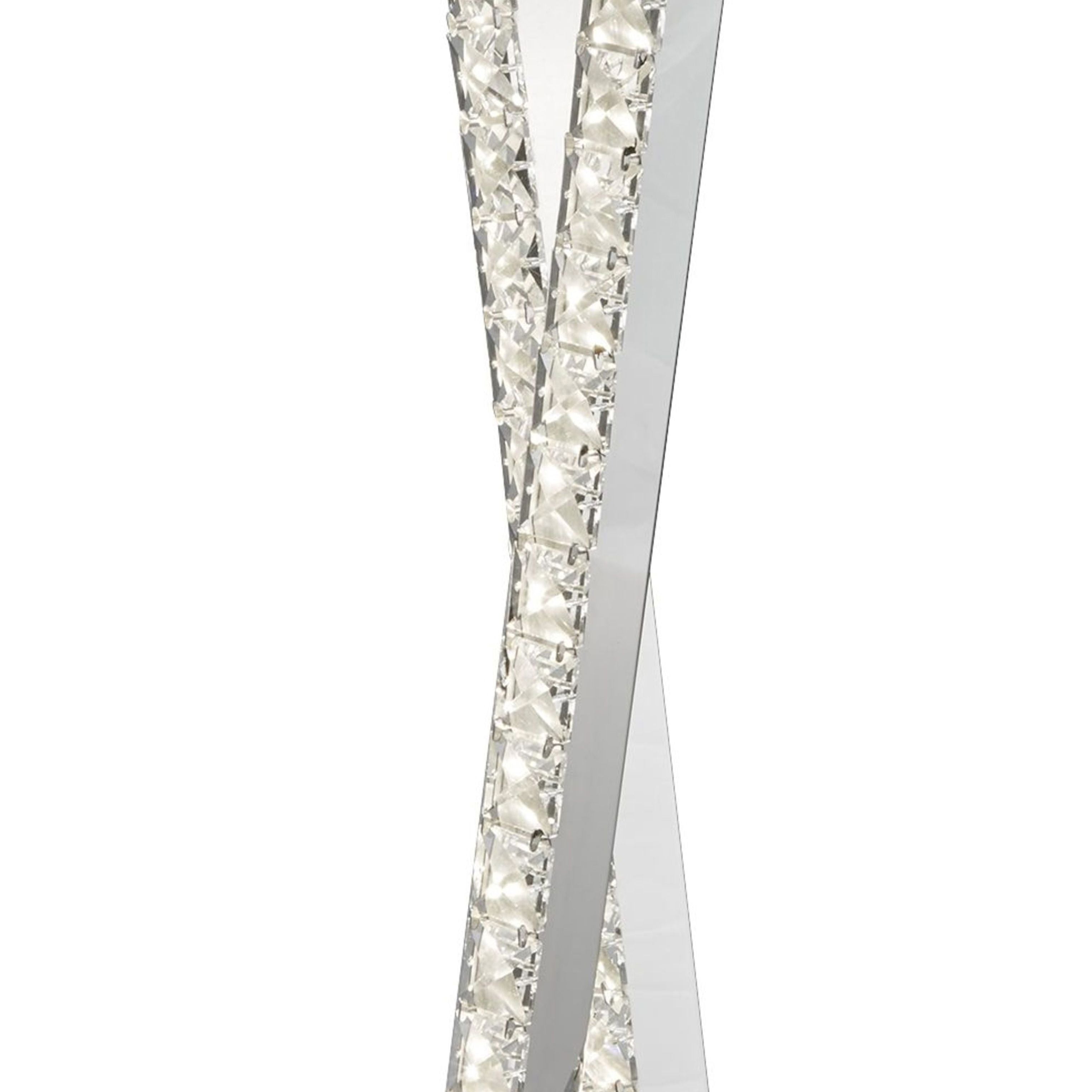 Close up of the Clover table lamp's crossed crystal strips, showing the faceted crystal detail and chrome edge