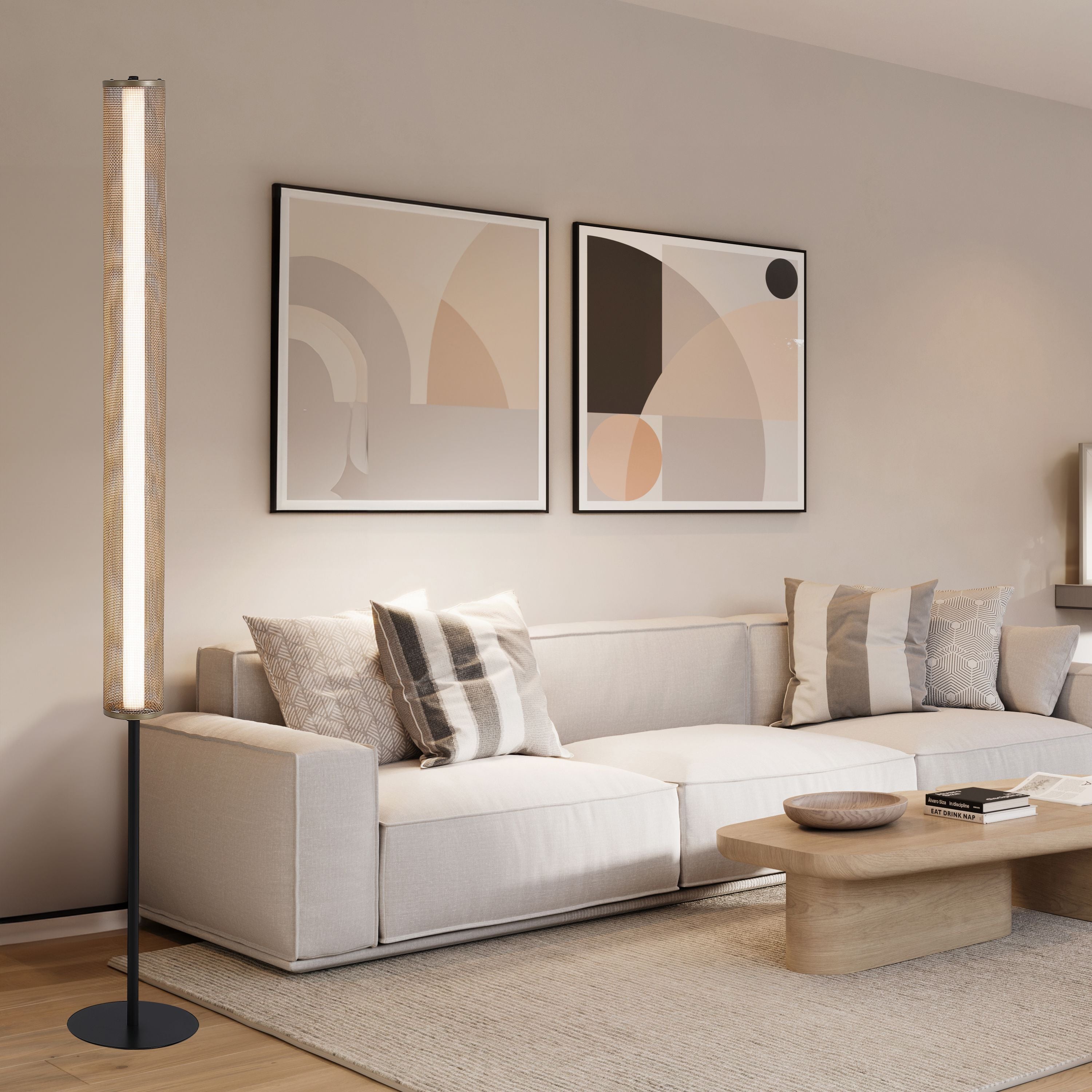 Searchlight Thread LED floor lamp in gold mesh and matt black, styled in a neutral living room beside a beige sofa, lit warm white
