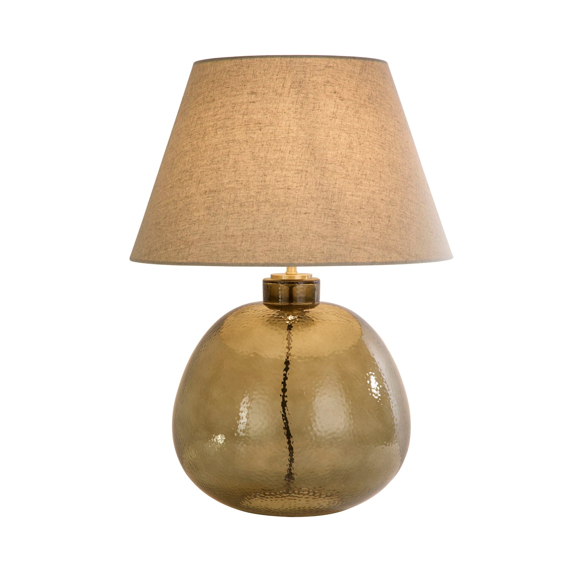 Searchlight Zenith table lamp with a round, hammered olive green glass base and a natural linen tapered shade, studio shot on a white background