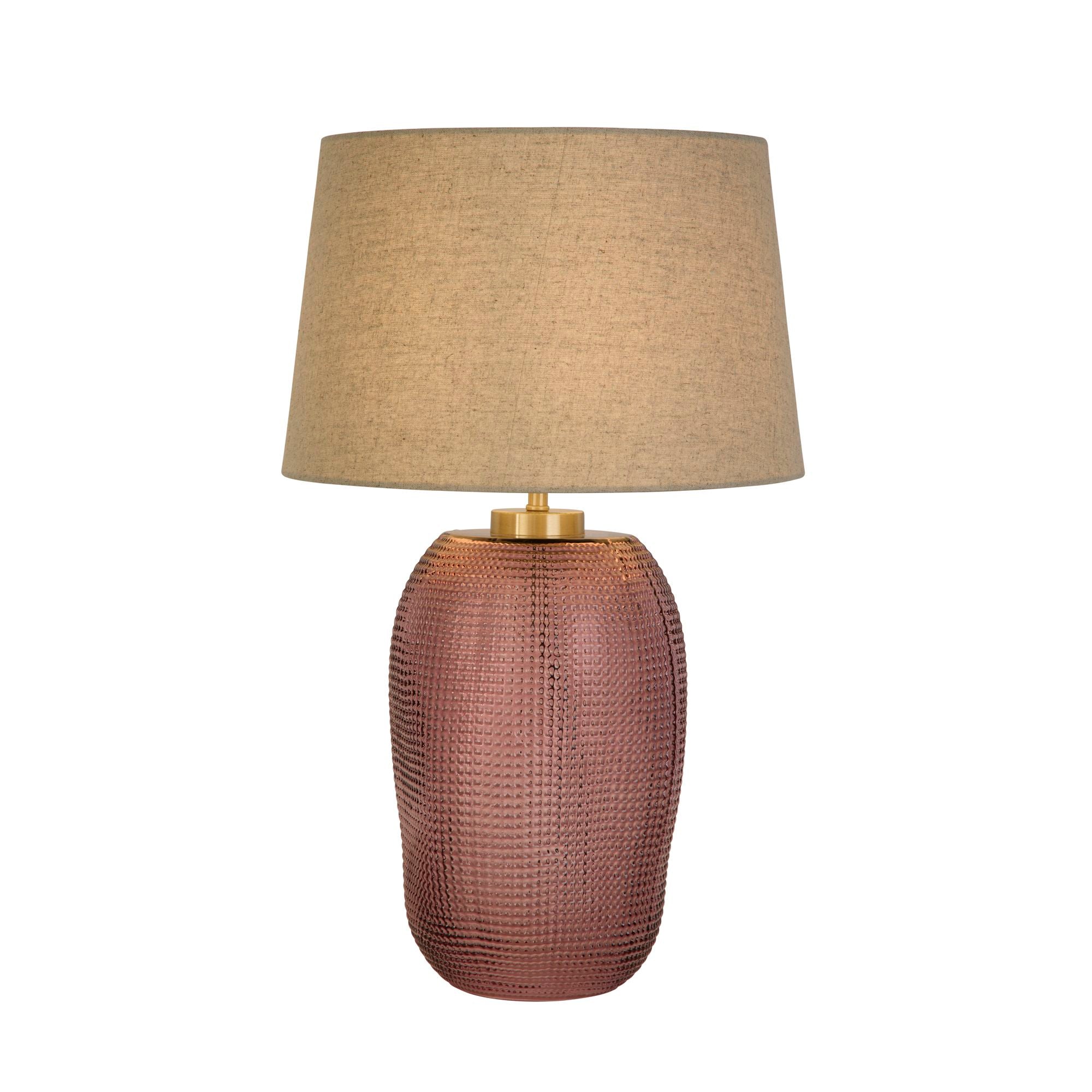 Searchlight Amethyst table lamp with textured pink glass base and natural linen shade, studio shot on a white background