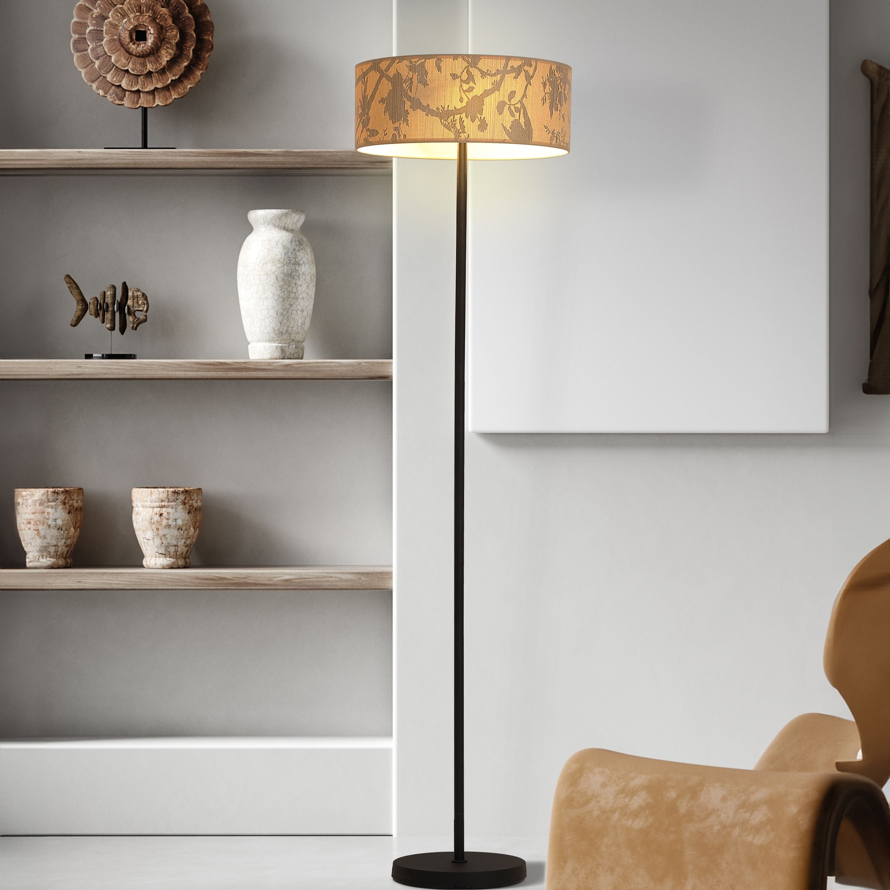 Isla 3 Light Floor Lamp styled beside a wooden bookshelf and armchair, glowing warmly in a living room setting