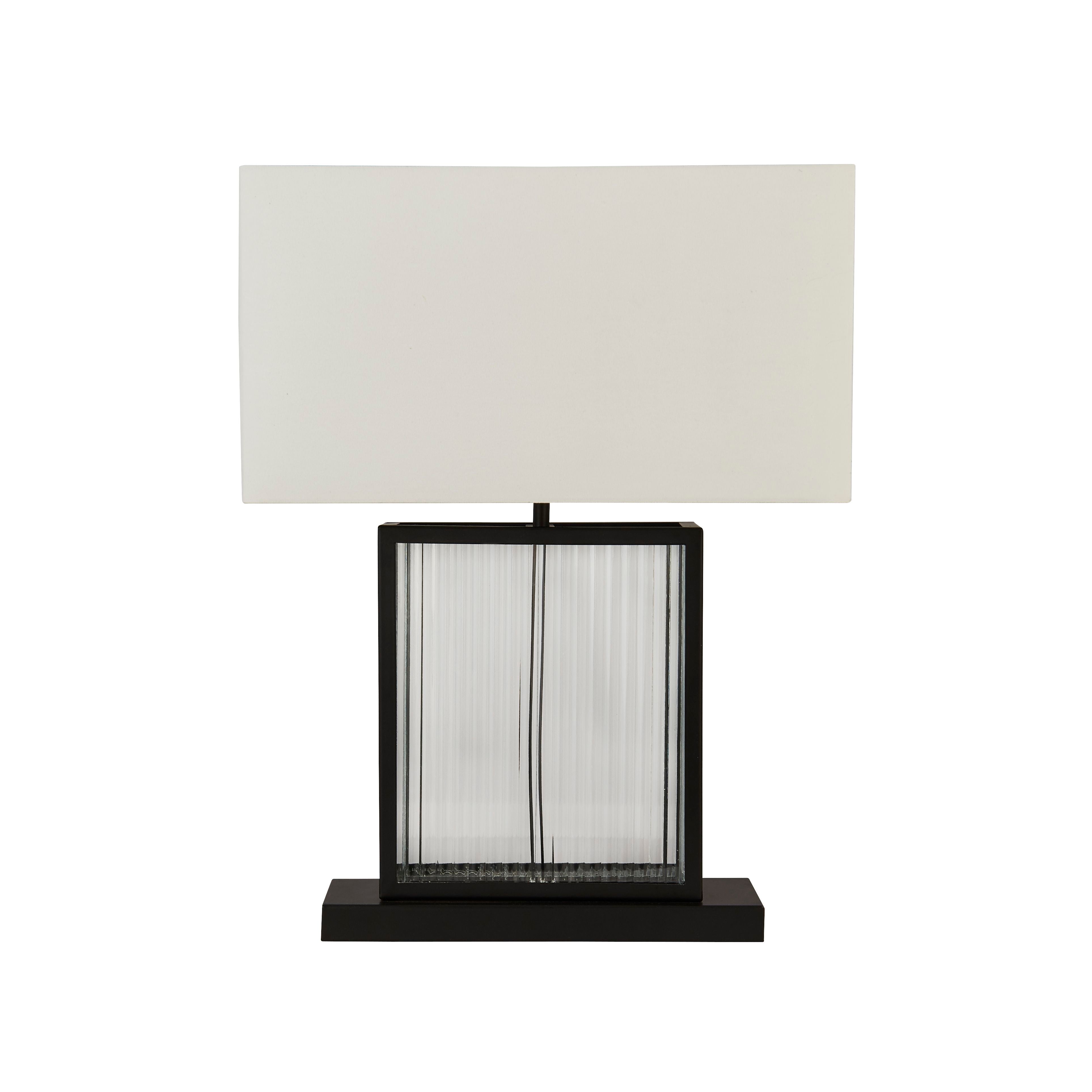 Searchlight Clarendon table lamp shown from the front, showing the fluted glass and black metal frame beneath the rectangular ivory shade