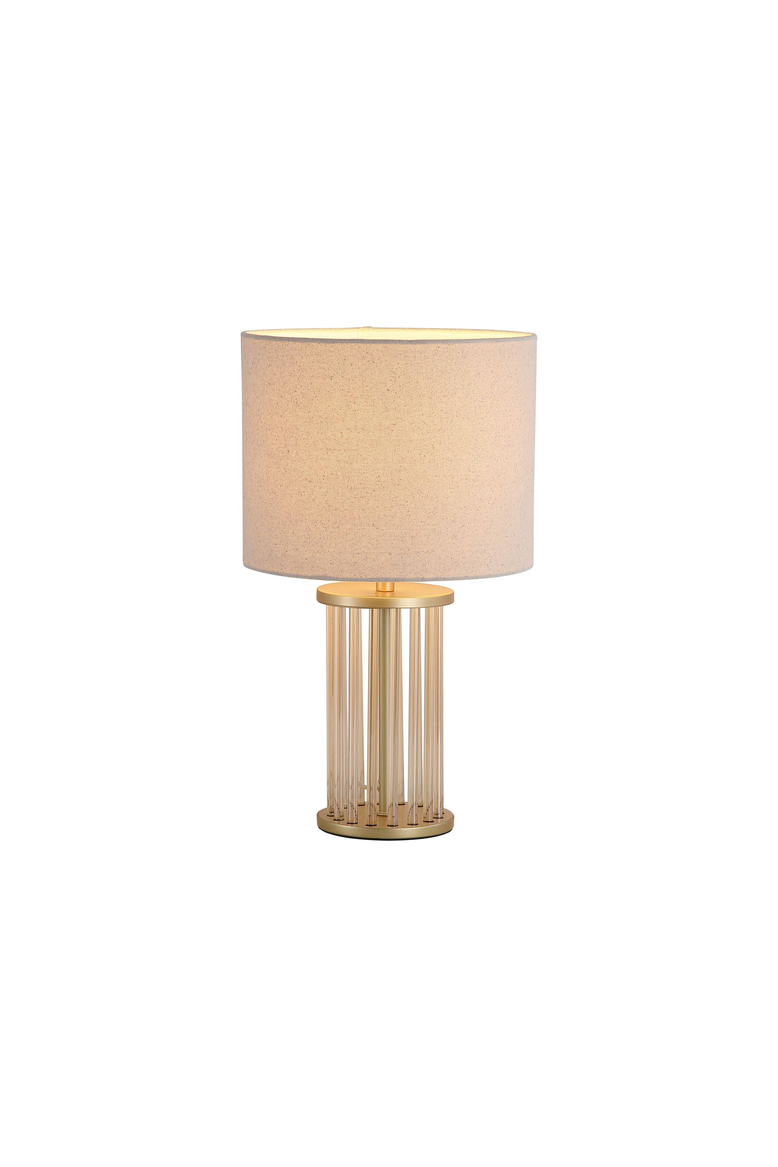 Searchlight Swizzle table lamp in gold with a white linen shade, studio shot on a white background