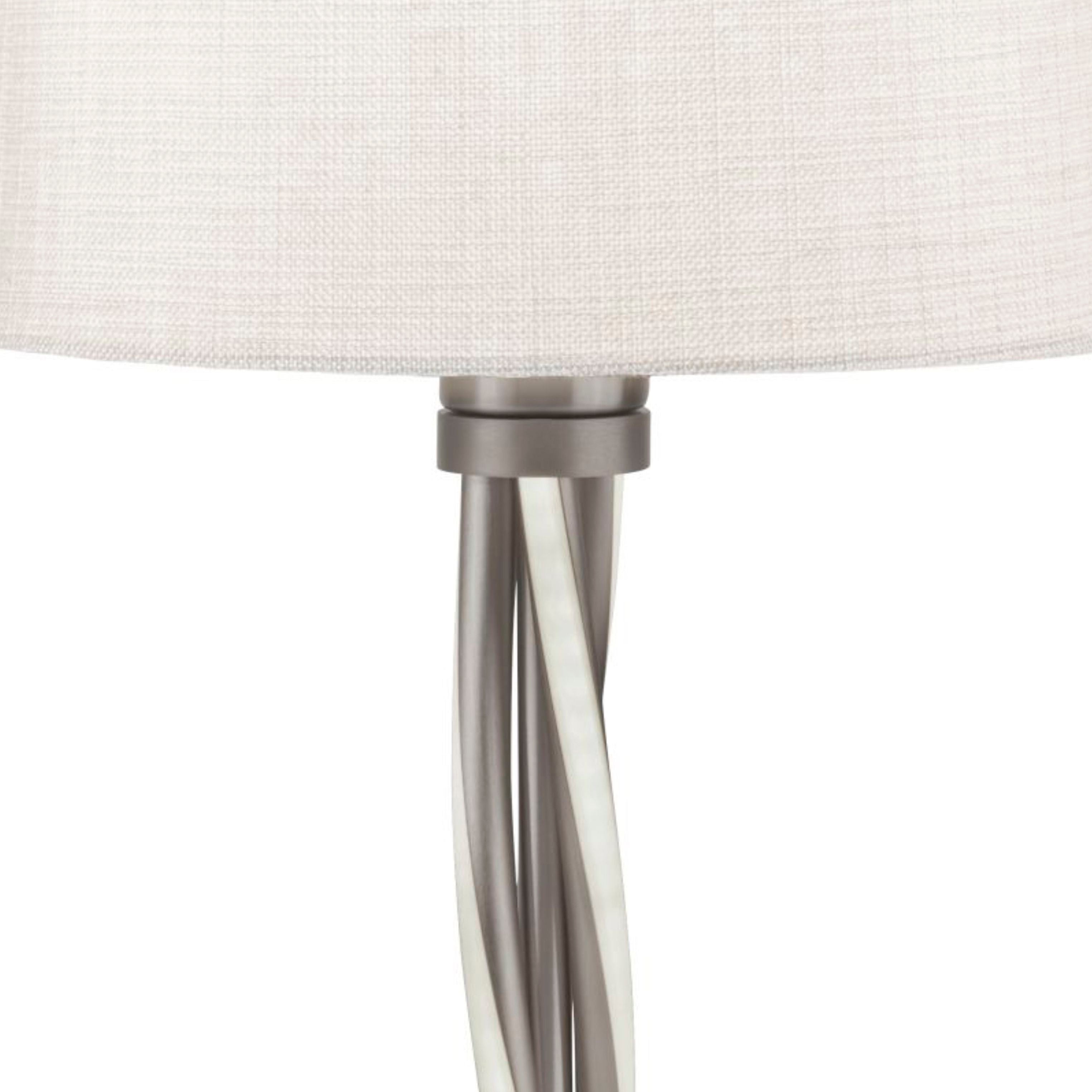 Close up of the Vegas table lamp's twisted aluminium and polycarbonate column beneath the shade
