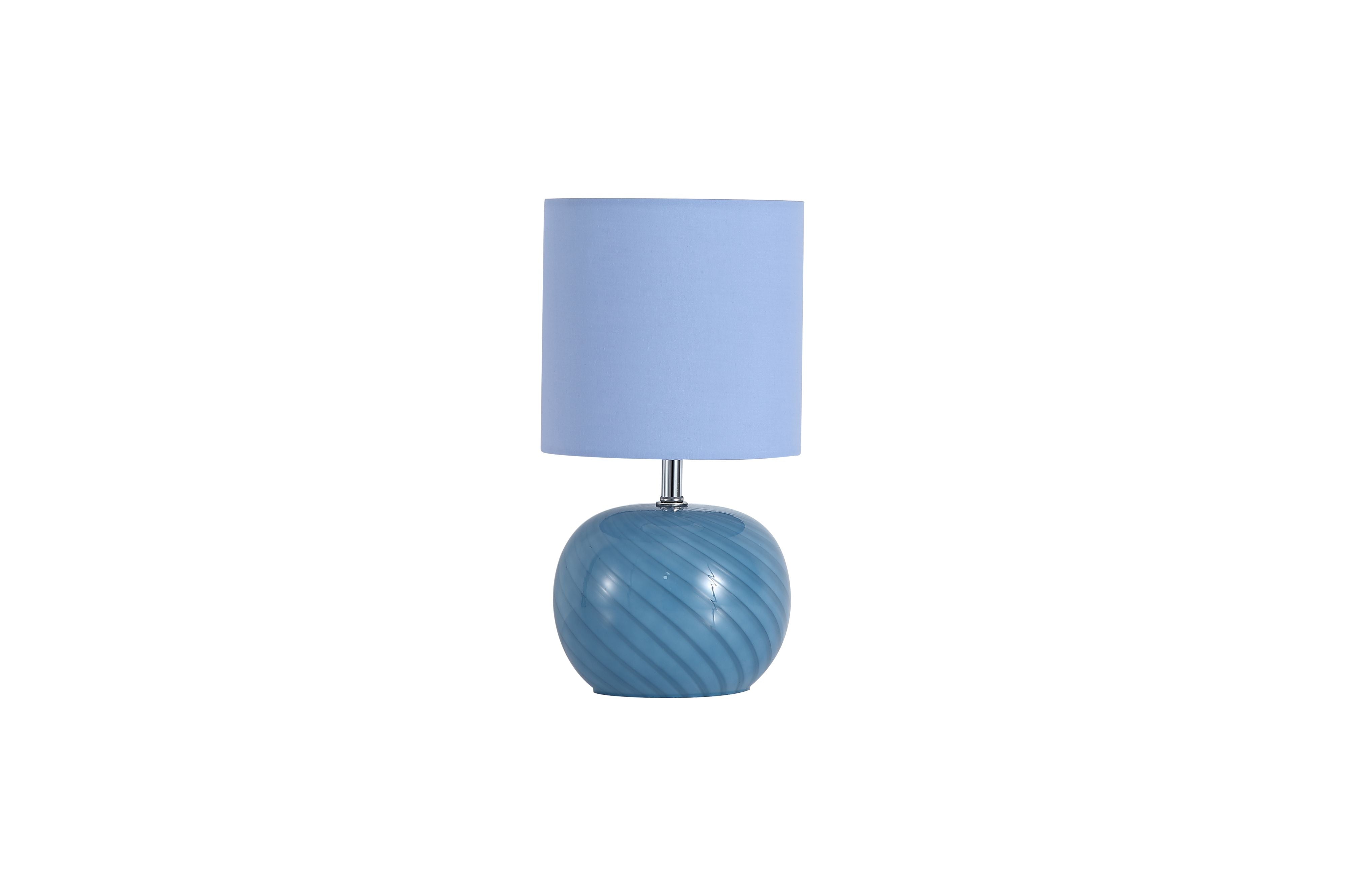 Close up of the Fete lamp's blue linen drum shade, showing the woven fabric texture