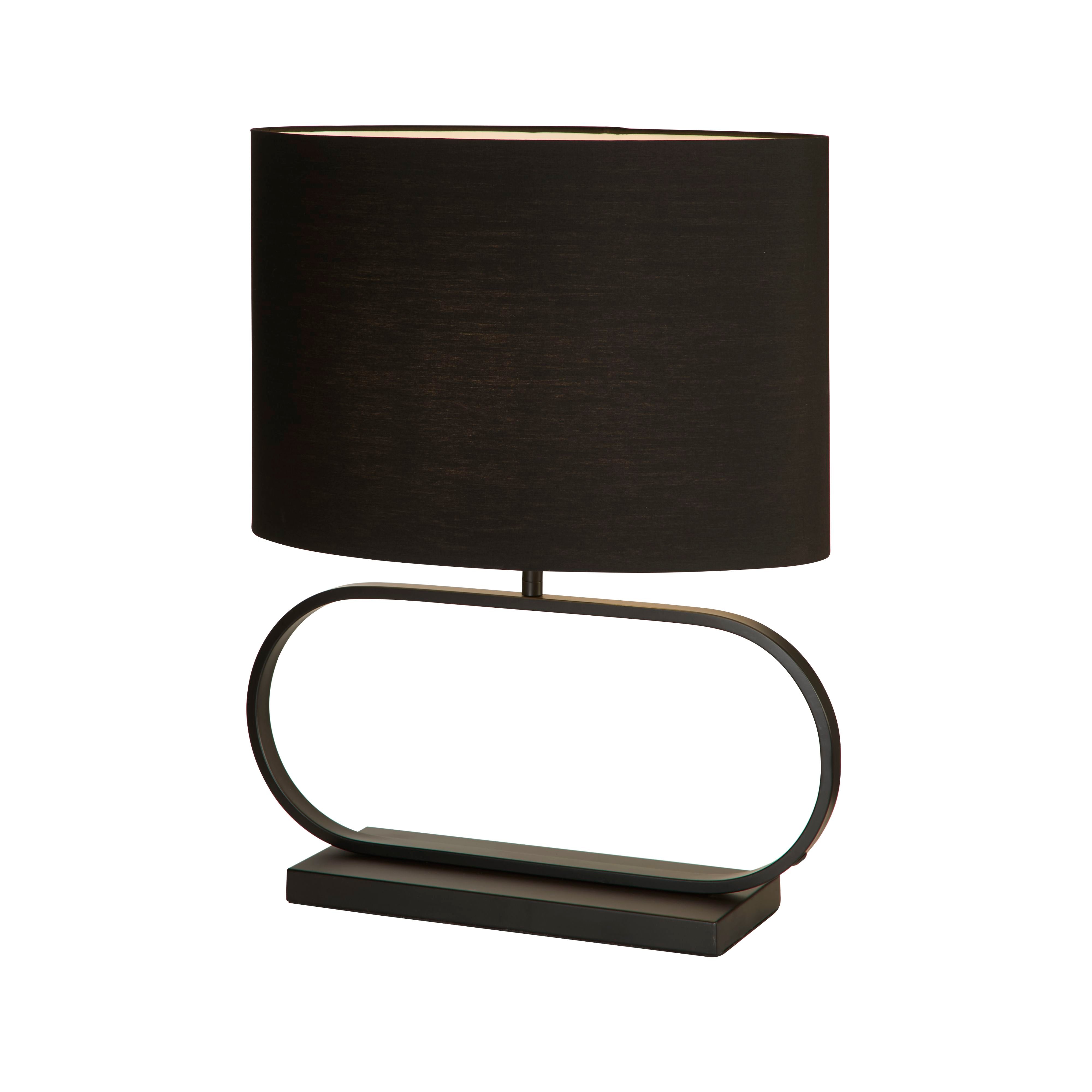 Searchlight Sleek table lamp in black, angled studio shot showing the oval black cotton shade and matching oval black metal base.