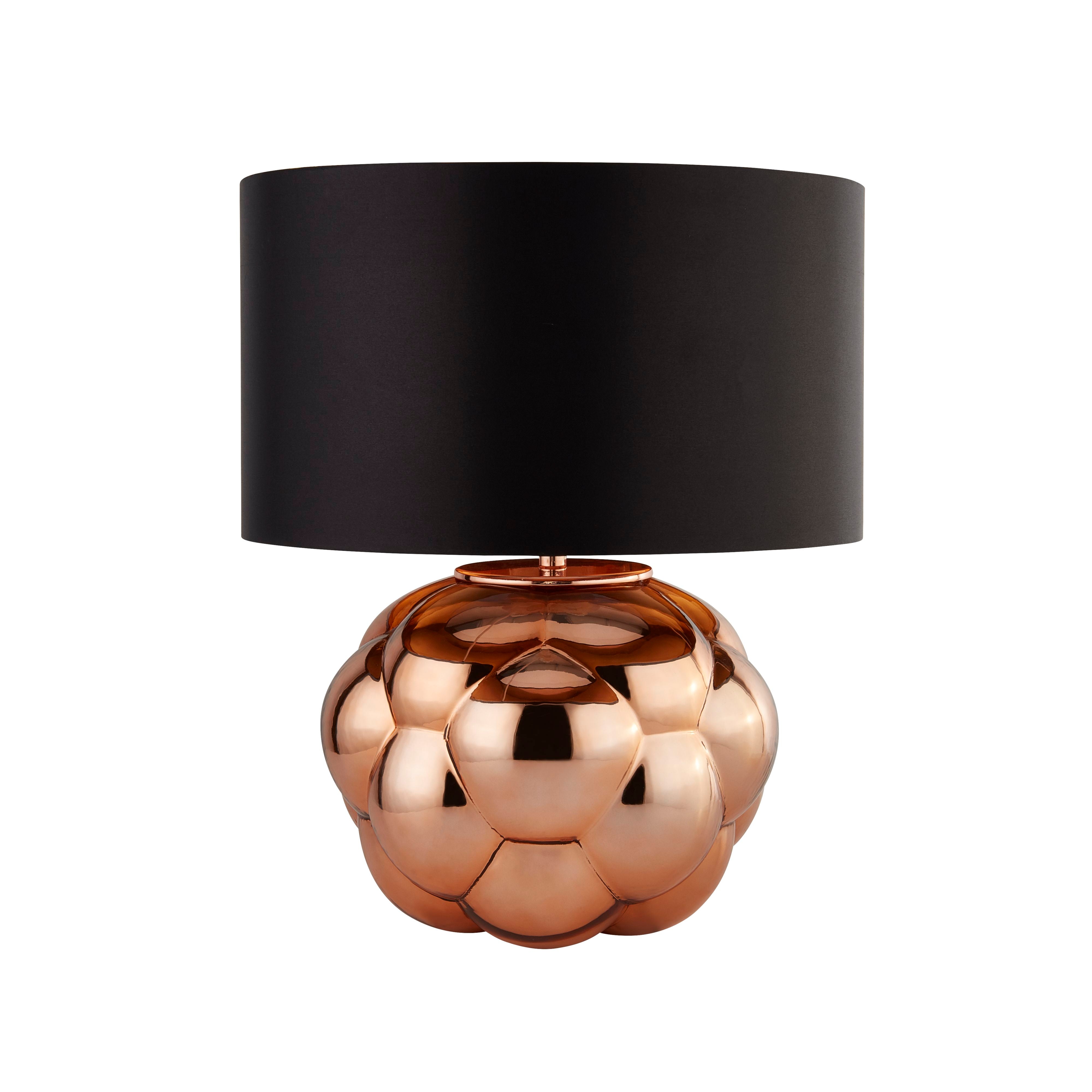 Searchlight Fizz table lamp with a bubbled copper glass base and black faux silk shade, angled studio shot on a white background