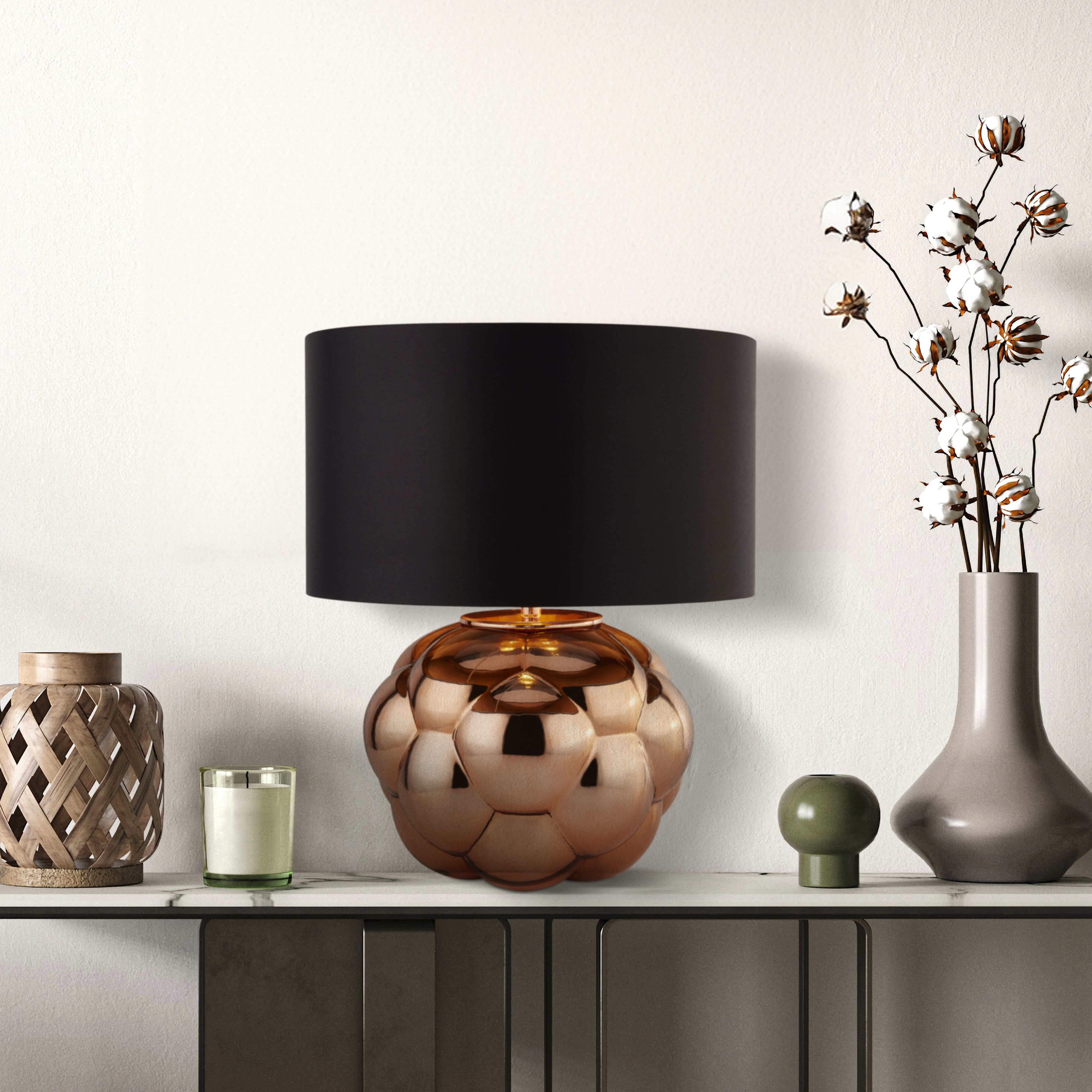 Searchlight Fizz table lamp styled on a marble topped console table beside dried cotton stems, copper glass base and black shade