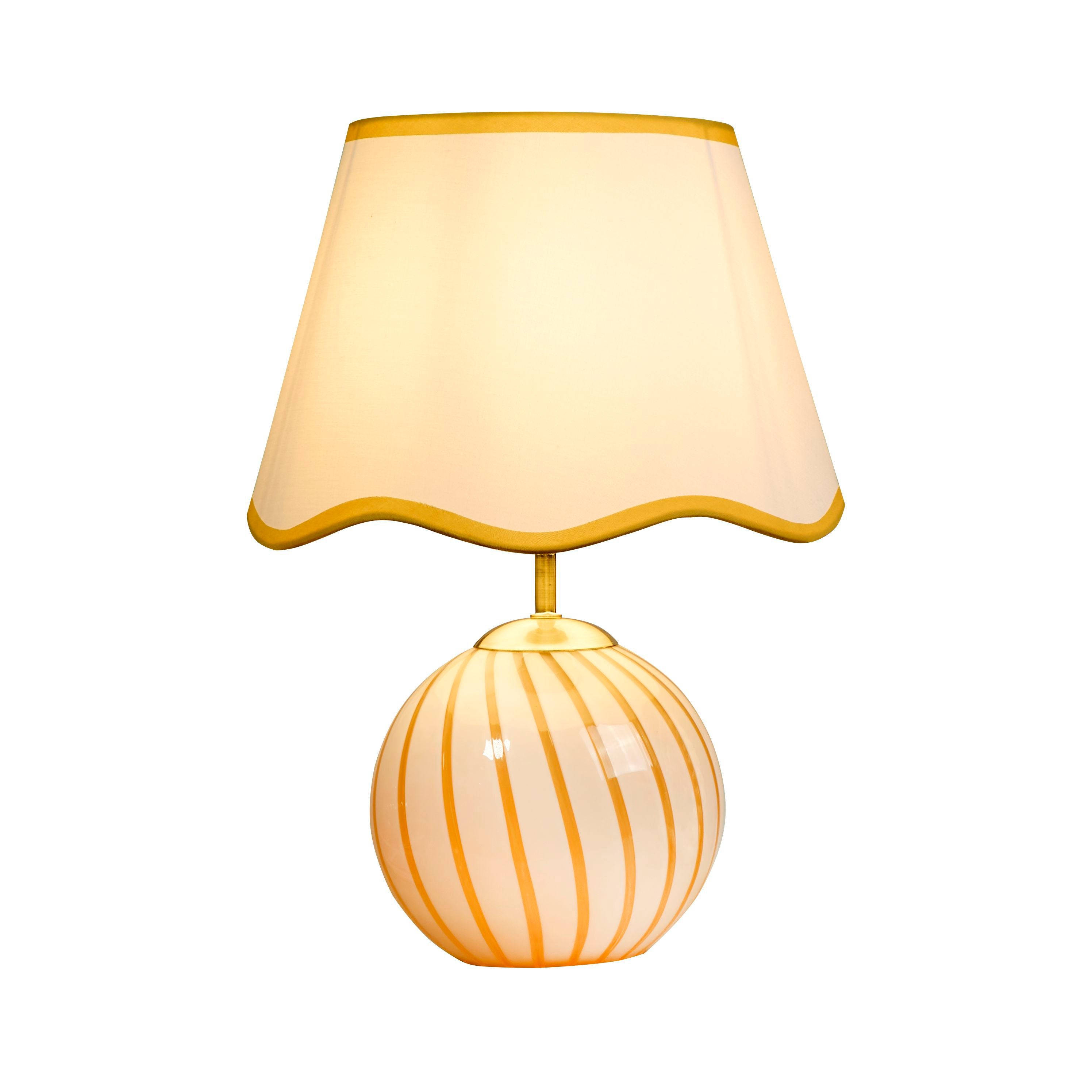 Searchlight Celine table lamp with yellow candy striped glass base and white scalloped shade trimmed in yellow, studio shot on white background