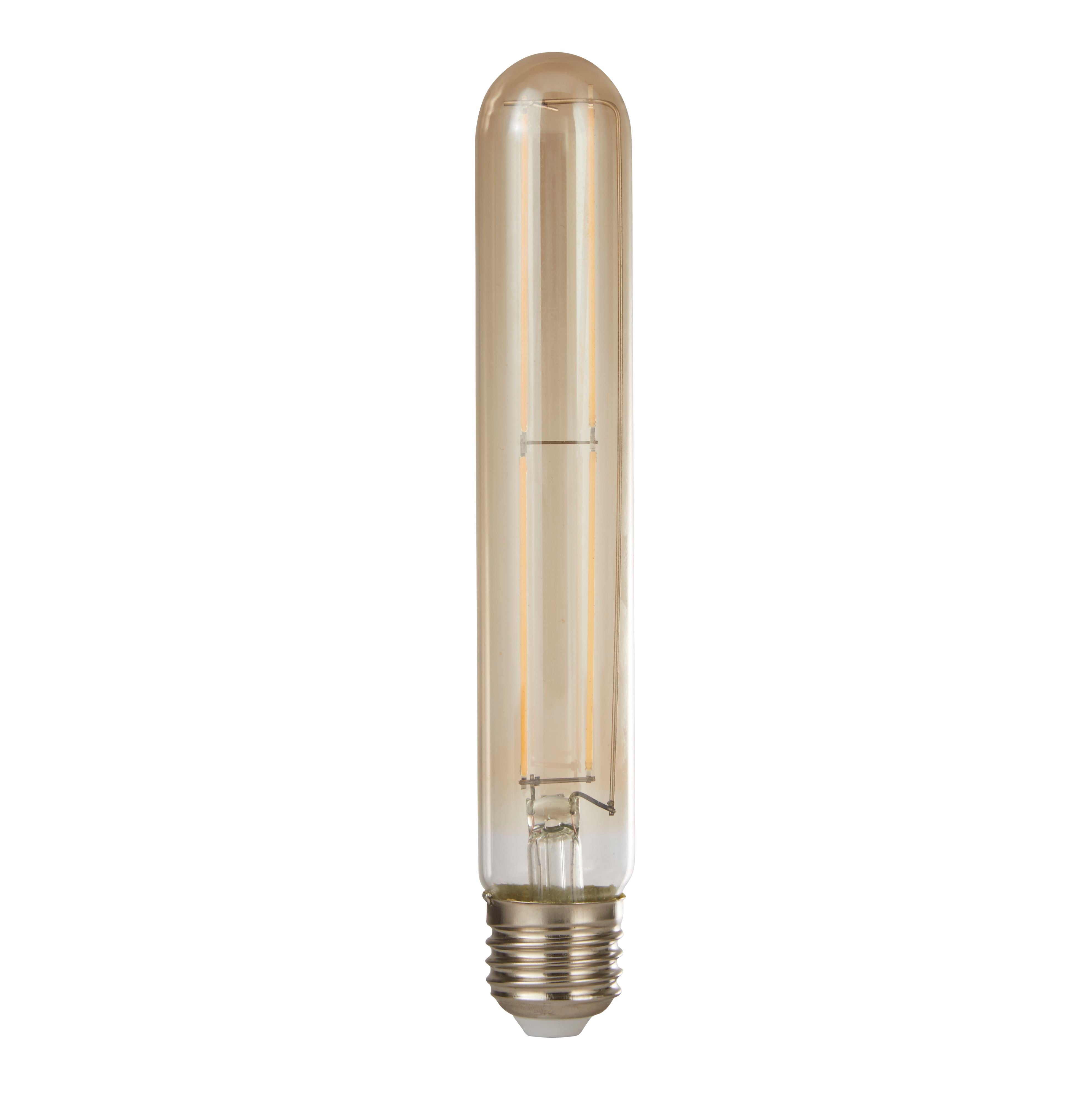 Searchlight amber tubular LED filament bulb with visible filament coils and E27 screw base, full length studio shot