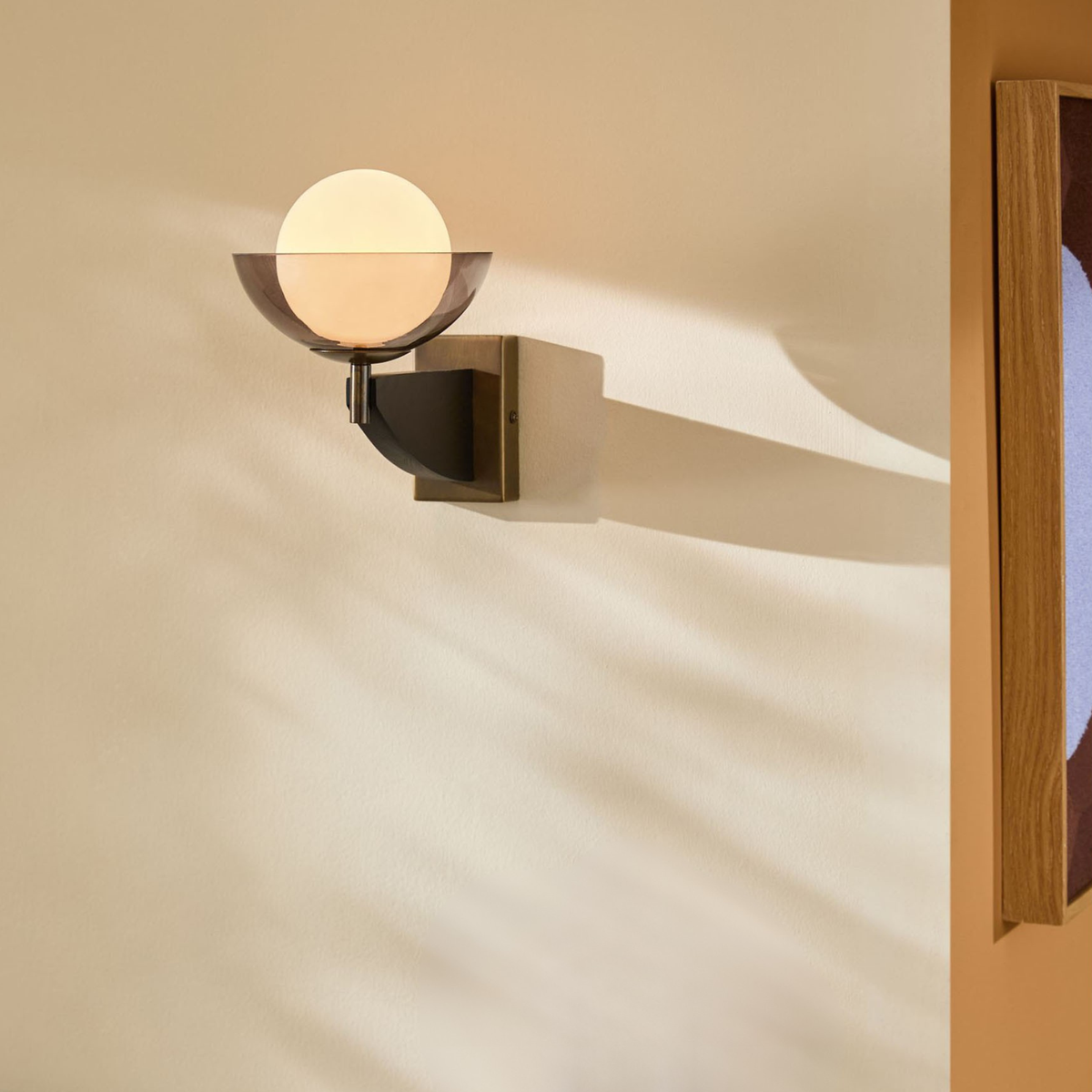 MADE.COM Layla Wall Light in Black Wood & Antique Brass with Smoked & Opal Glass Shade