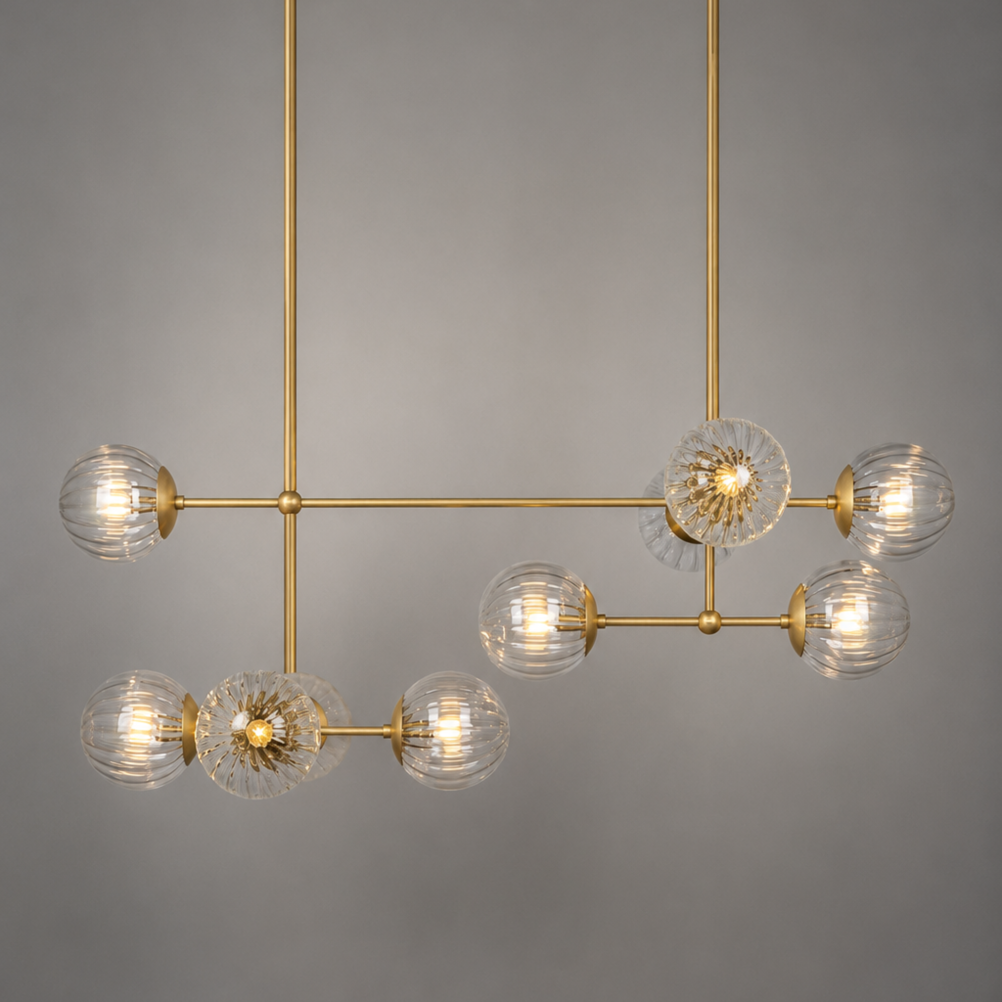 Schwung Armstrong Linear 10 Light Chandelier - Dries Ribbon Glass