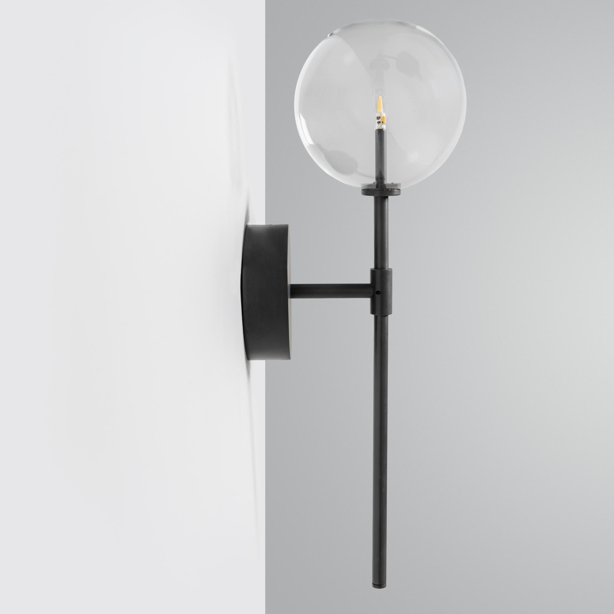 Schwung Dawn Single Wall Sconce Light - Transparent Glass