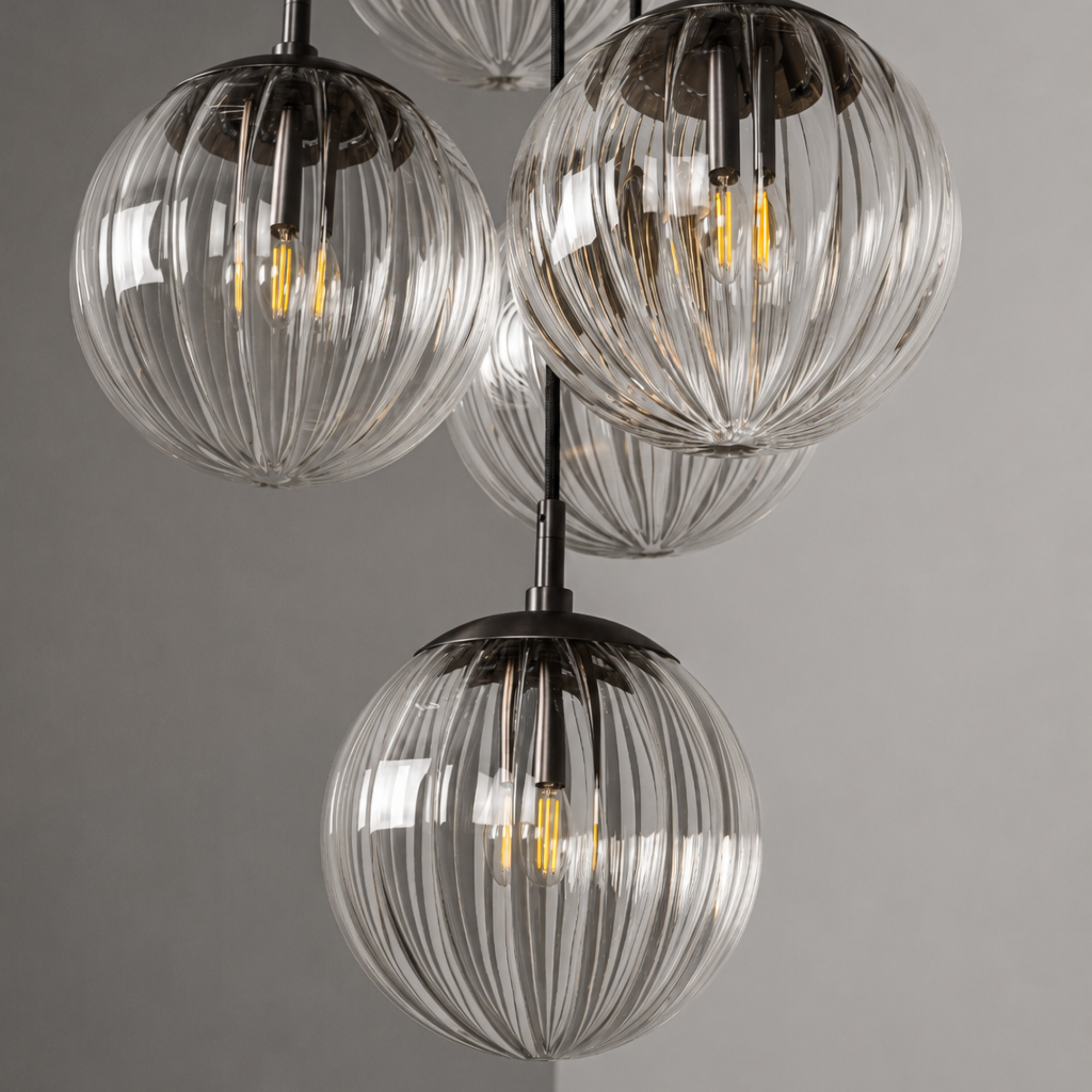 Schwung Globe Cluster 10 Light Chandelier - Dries Ribbon Glass