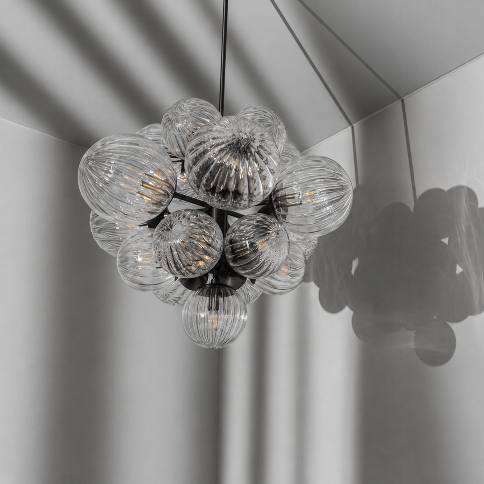 Schwung Nova 19 Light Chandelier - Dries Ribbon Glass
