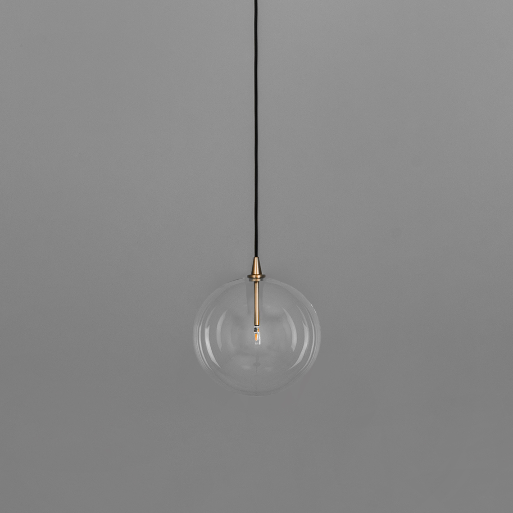 Schwung Glass Globe Single Pendant - Transparent Glass