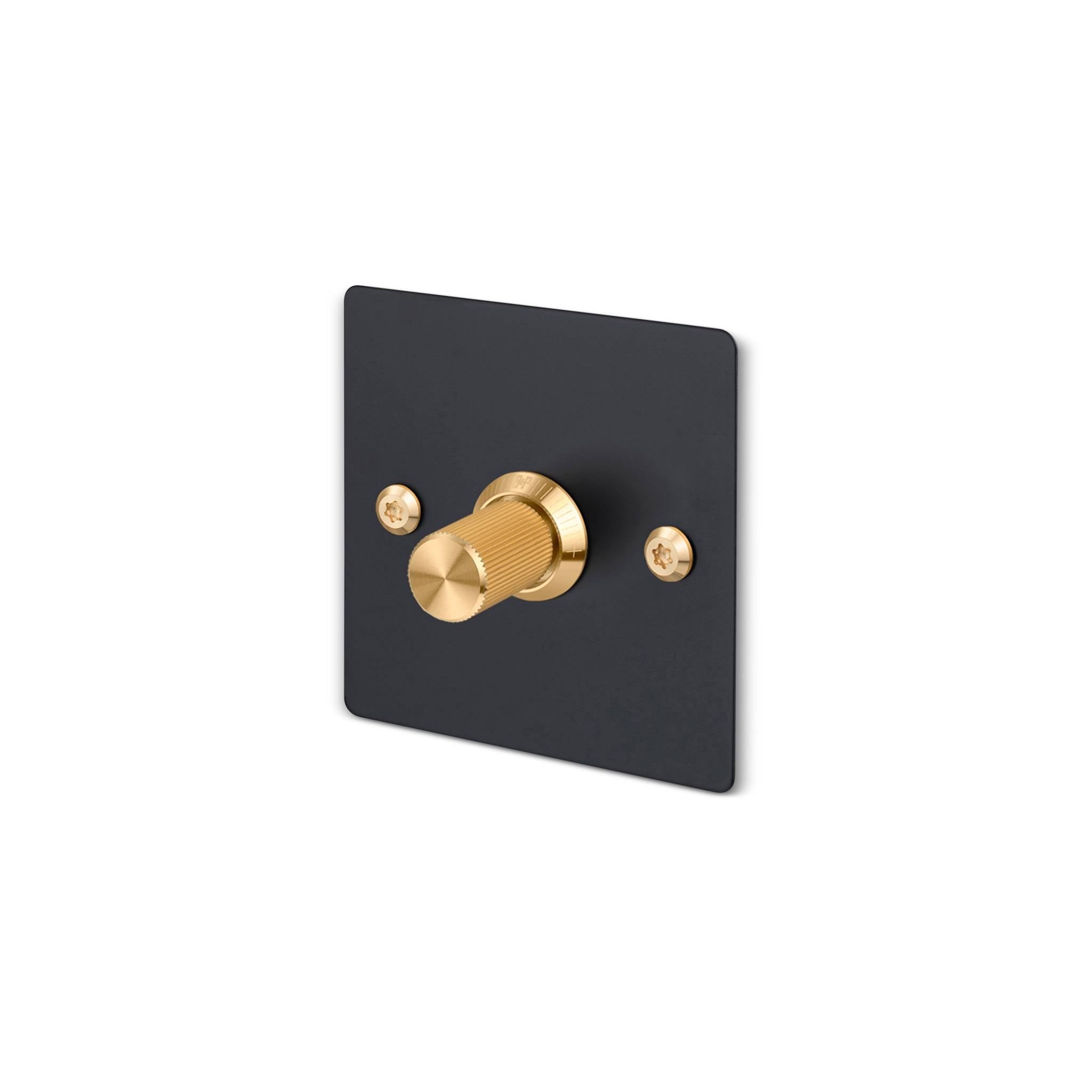 Buster + Punch 1G dimmer switch, black plate with brass linear knurl knob, isolated cutout