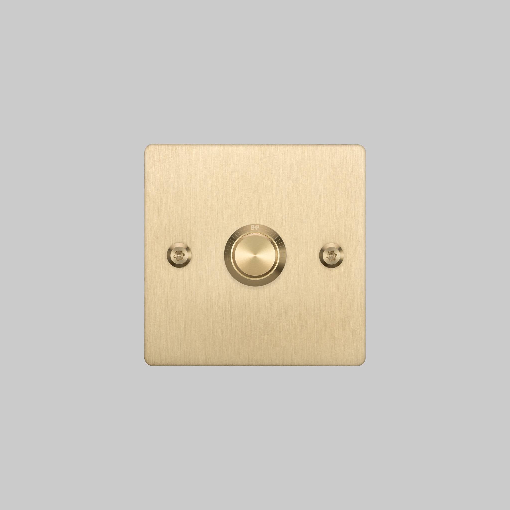 Buster + Punch 1G Dimmer switch, Brass plate with Brass linear knurl knob, elevated angle