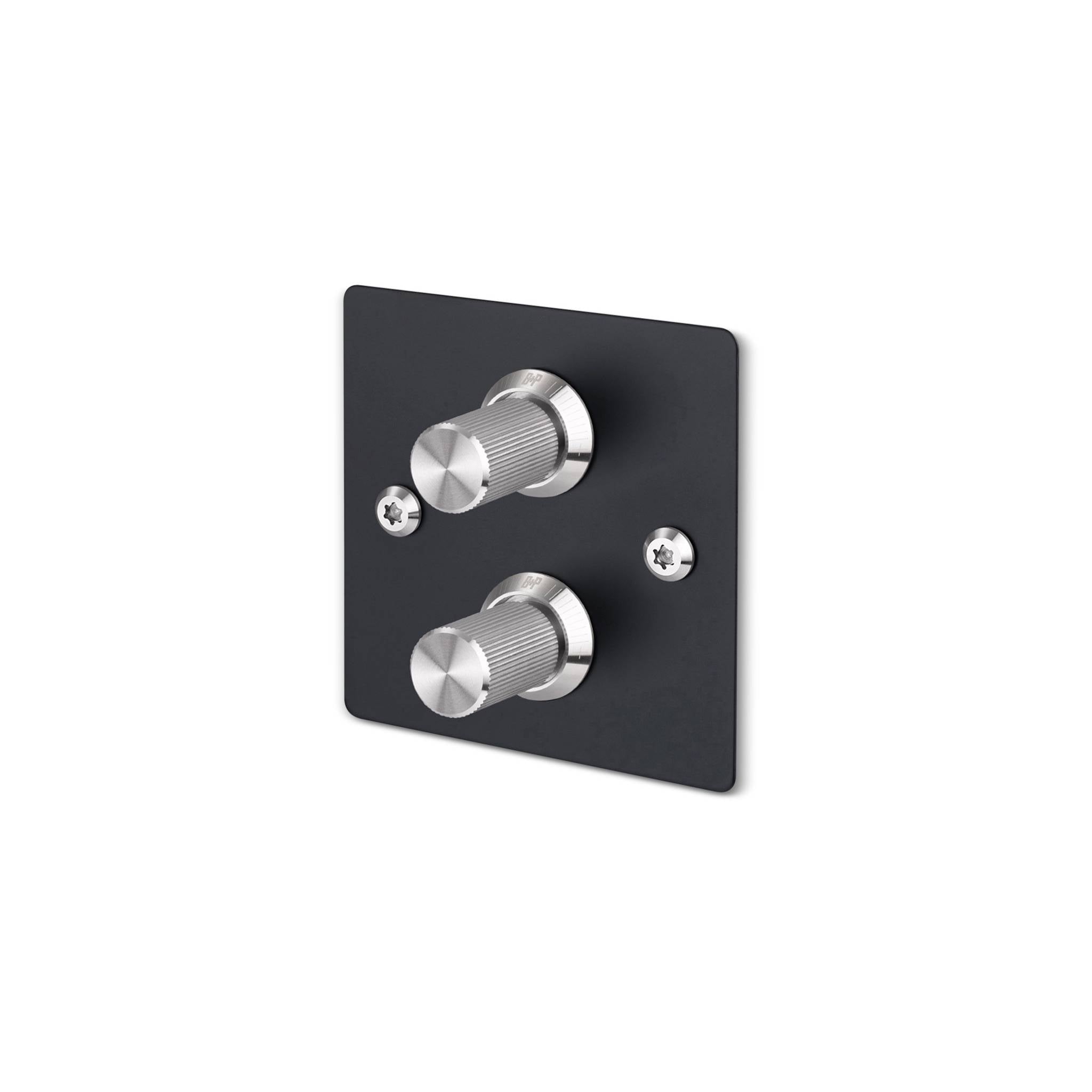 Buster + Punch 2G dimmer switch, black plate with steel linear knurl knobs, isolated cutout