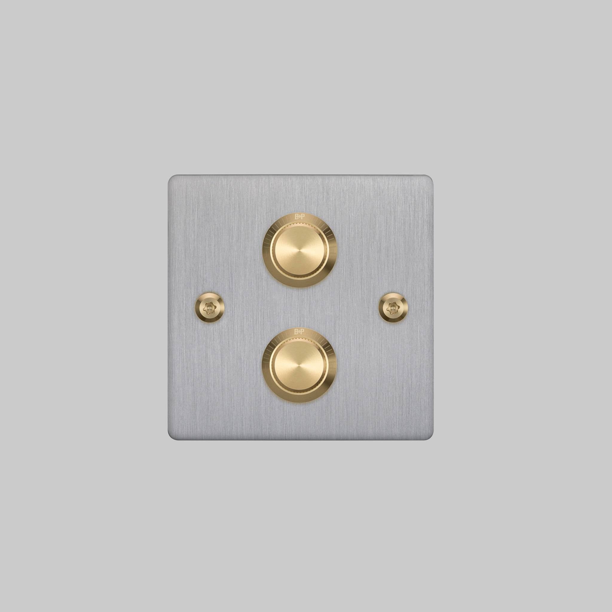 Buster + Punch 2G dimmer switch, steel plate with brass linear knurl knobs, front elevation
