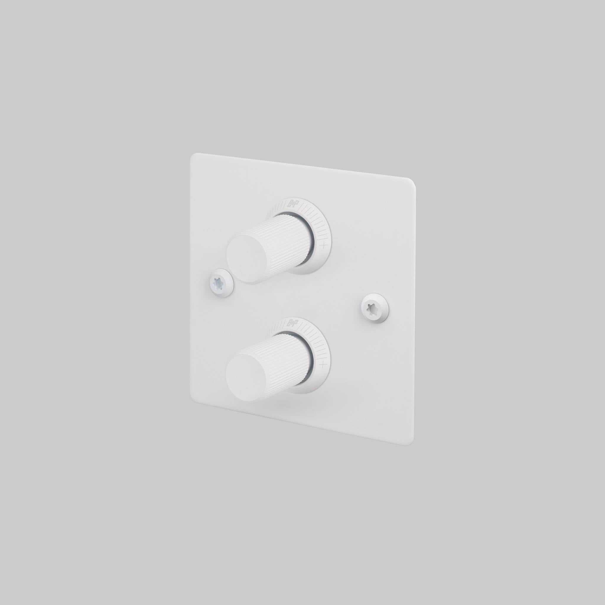 Buster + Punch 2G dimmer switch, white plate with white linear knurl knob, front view