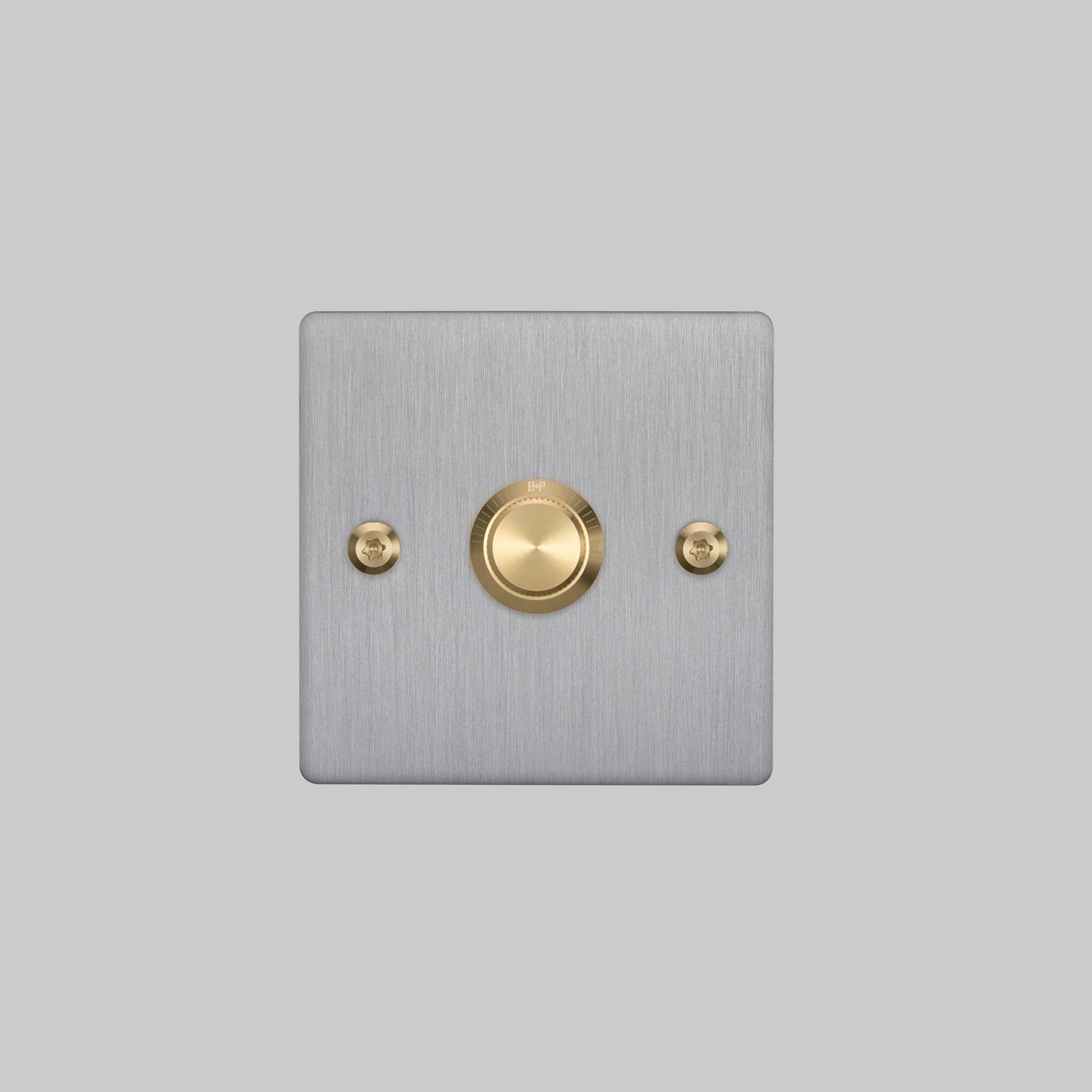 Buster + Punch 1G Dimmer switch, Steel plate with Brass linear knurl knob, elevated angle