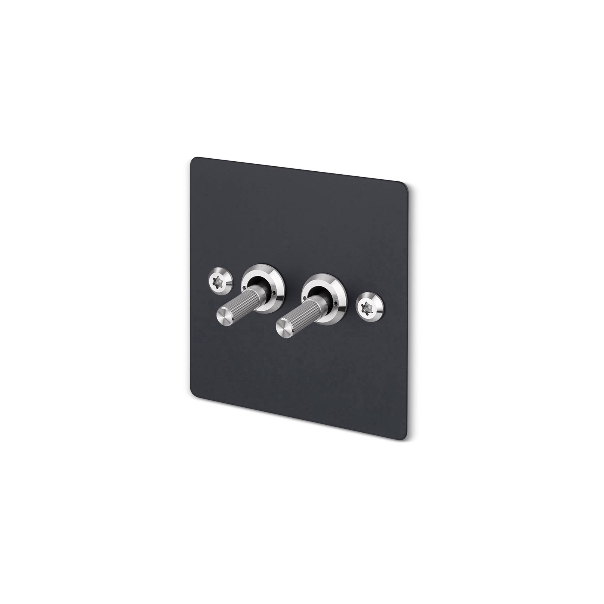Buster + Punch 2G 2-way toggle switch, black plate with steel linear knurl toggle arm, isolated cutout