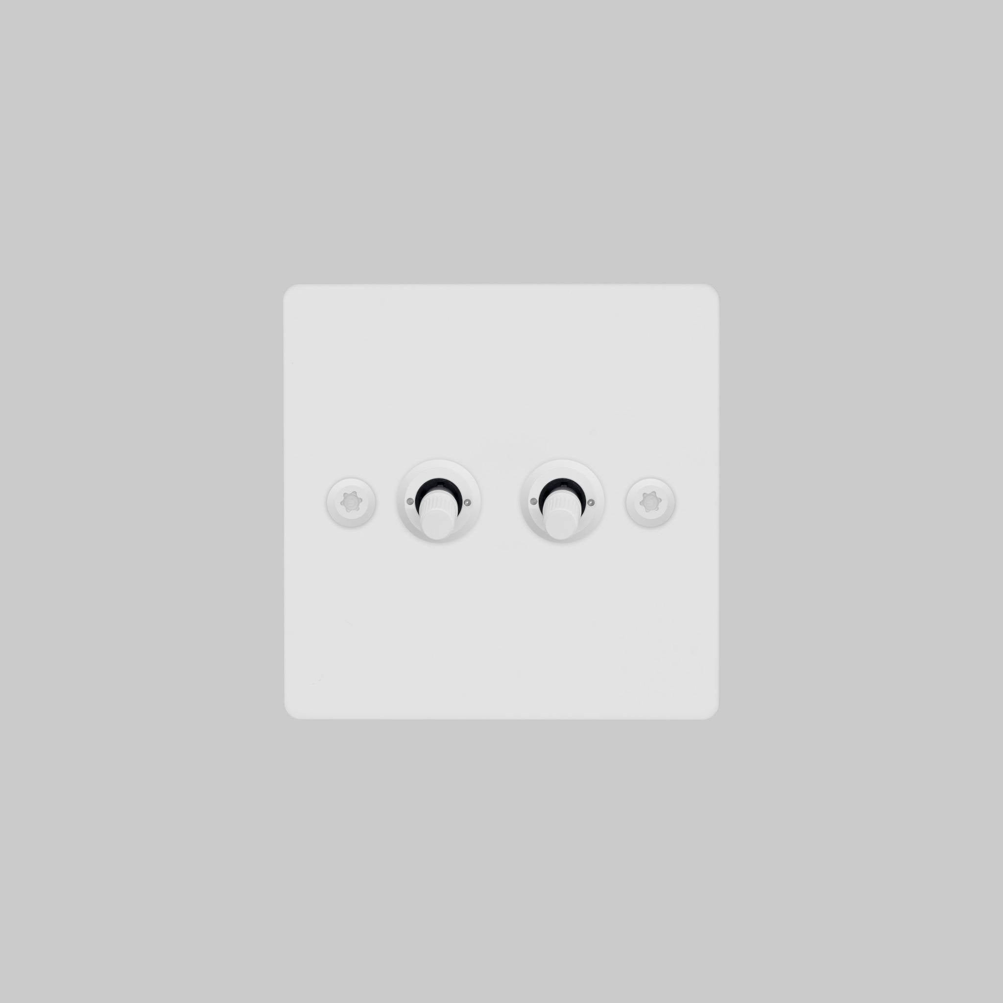 Buster + Punch 2G toggle switch, white plate with white linear knurl toggle arms, elevated angle