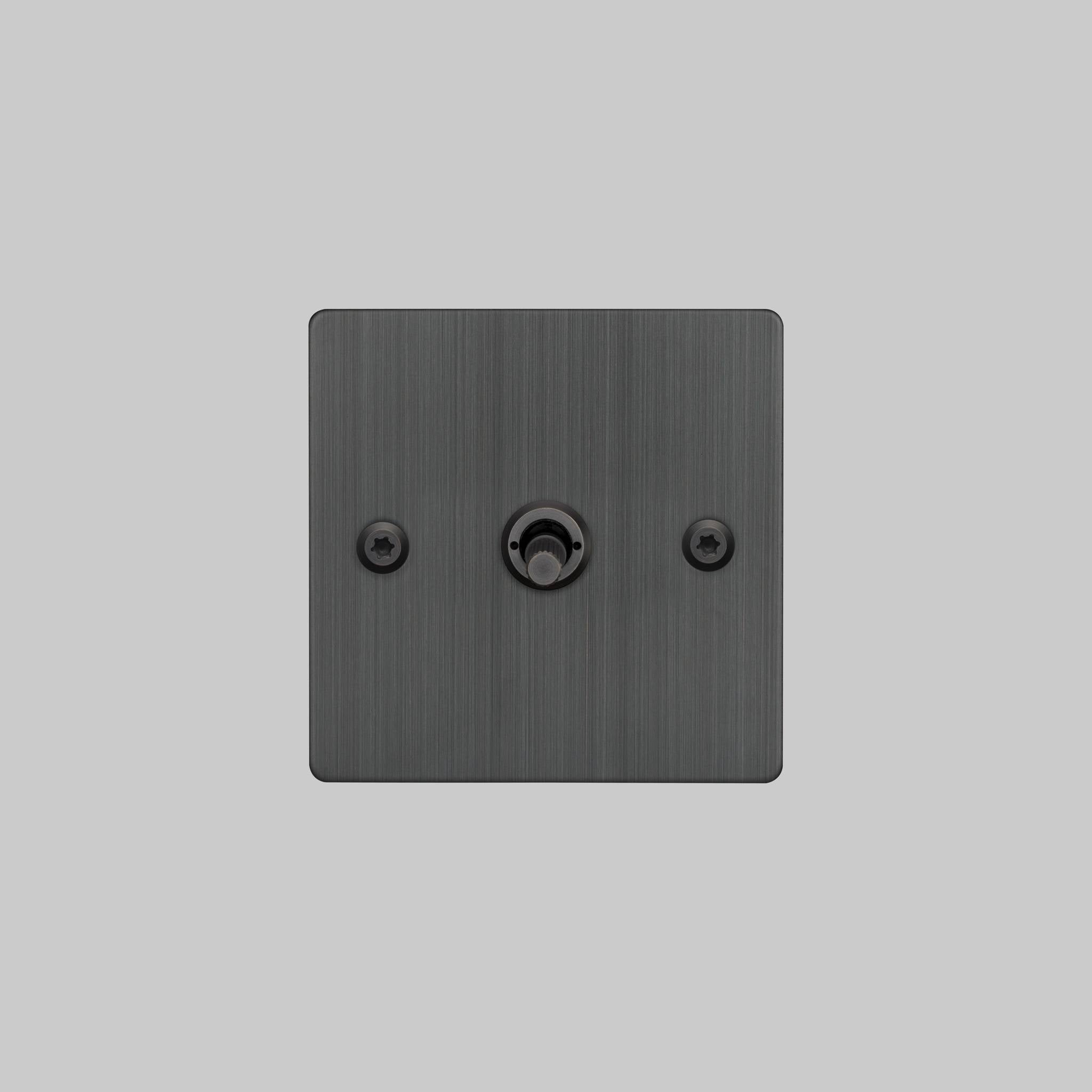 Buster + Punch 1G 2 way toggle switch, Smoked Bronze plate with Smoked Bronze linear knurl toggle arm, front view