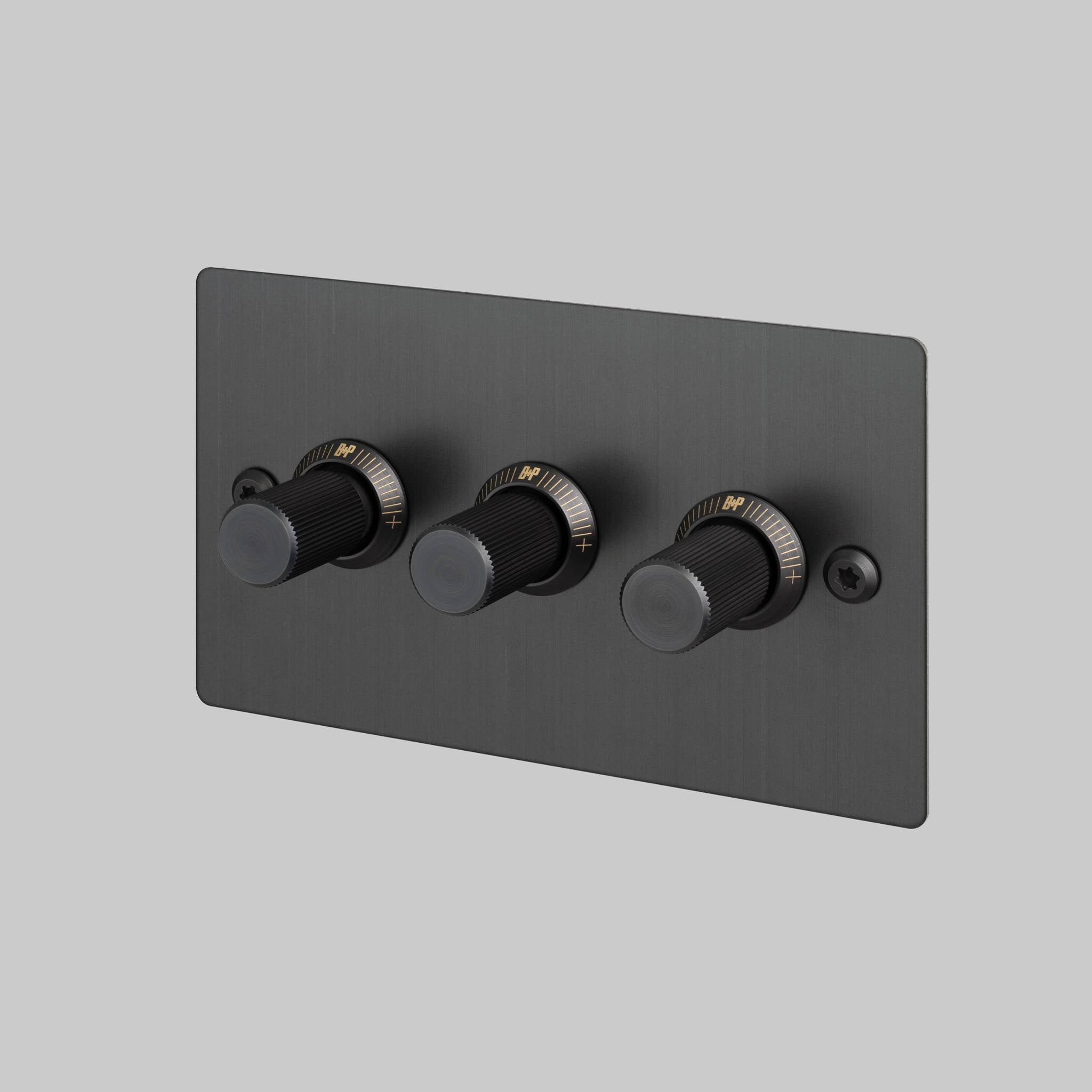 Buster + Punch 3G dimmer switch, Smoked Bronze plate with Smoked Bronze linear knurl knob, front angled view