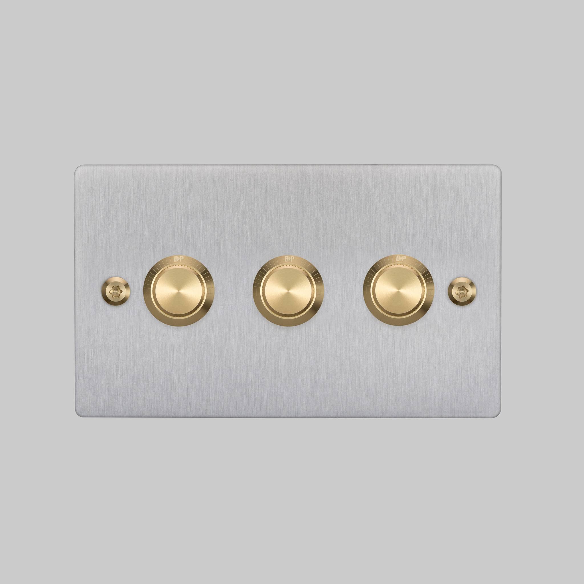Buster + Punch 3G dimmer switch, Steel plate with Brass linear knurl knob, front elevation view
