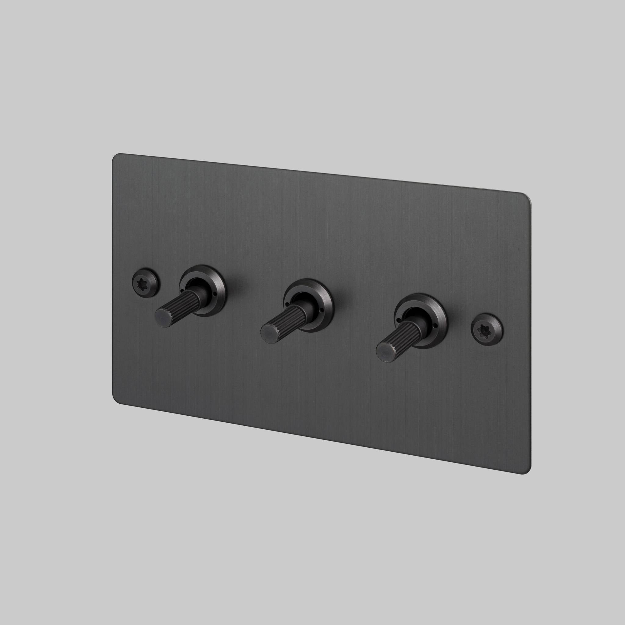 Buster + Punch 3G toggle switch, Smoked Bronze plate with Smoked Bronze linear knurl toggle arm, front angled view