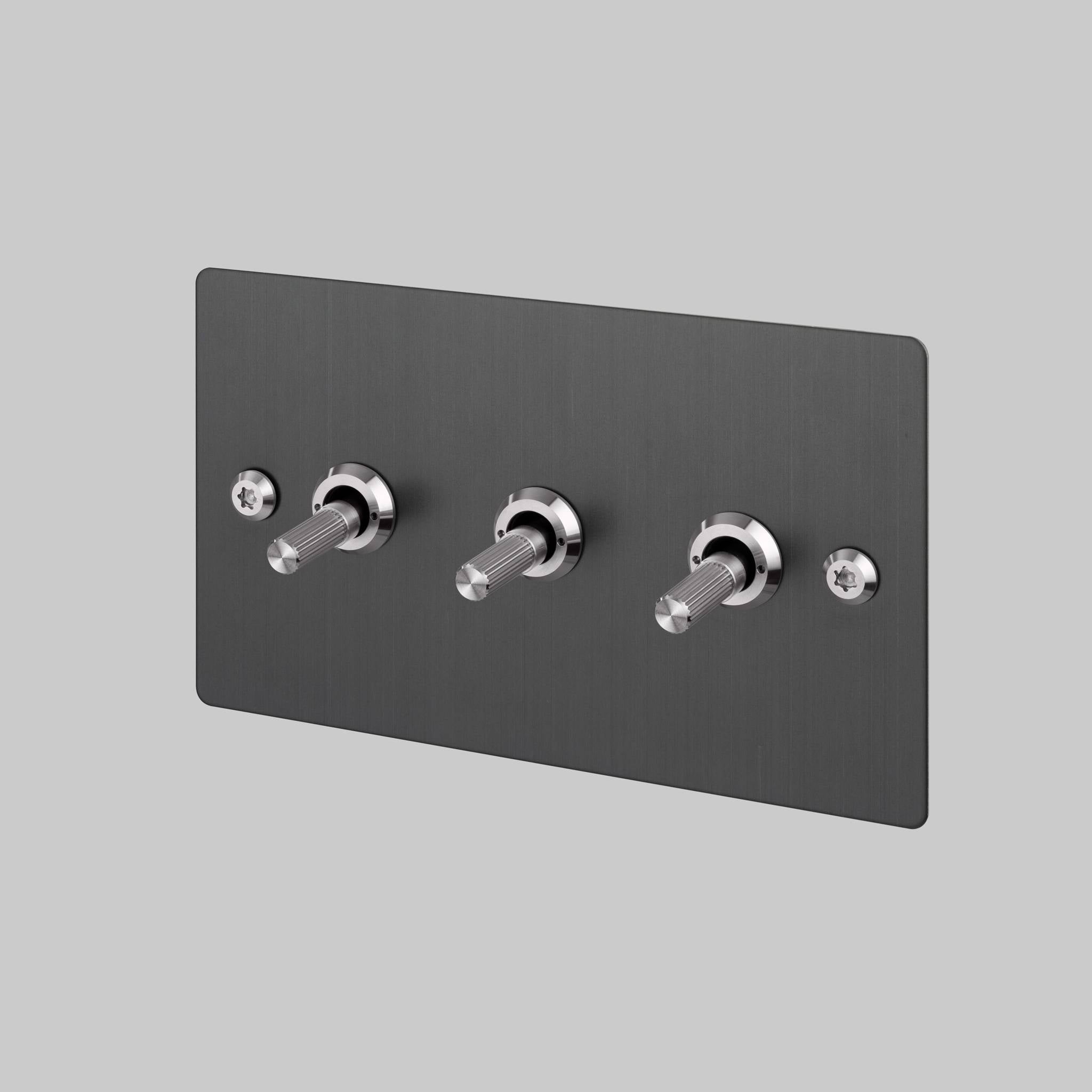 Buster + Punch 3G toggle switch, Smoked Bronze plate with Steel linear knurl toggle arm, front angled view